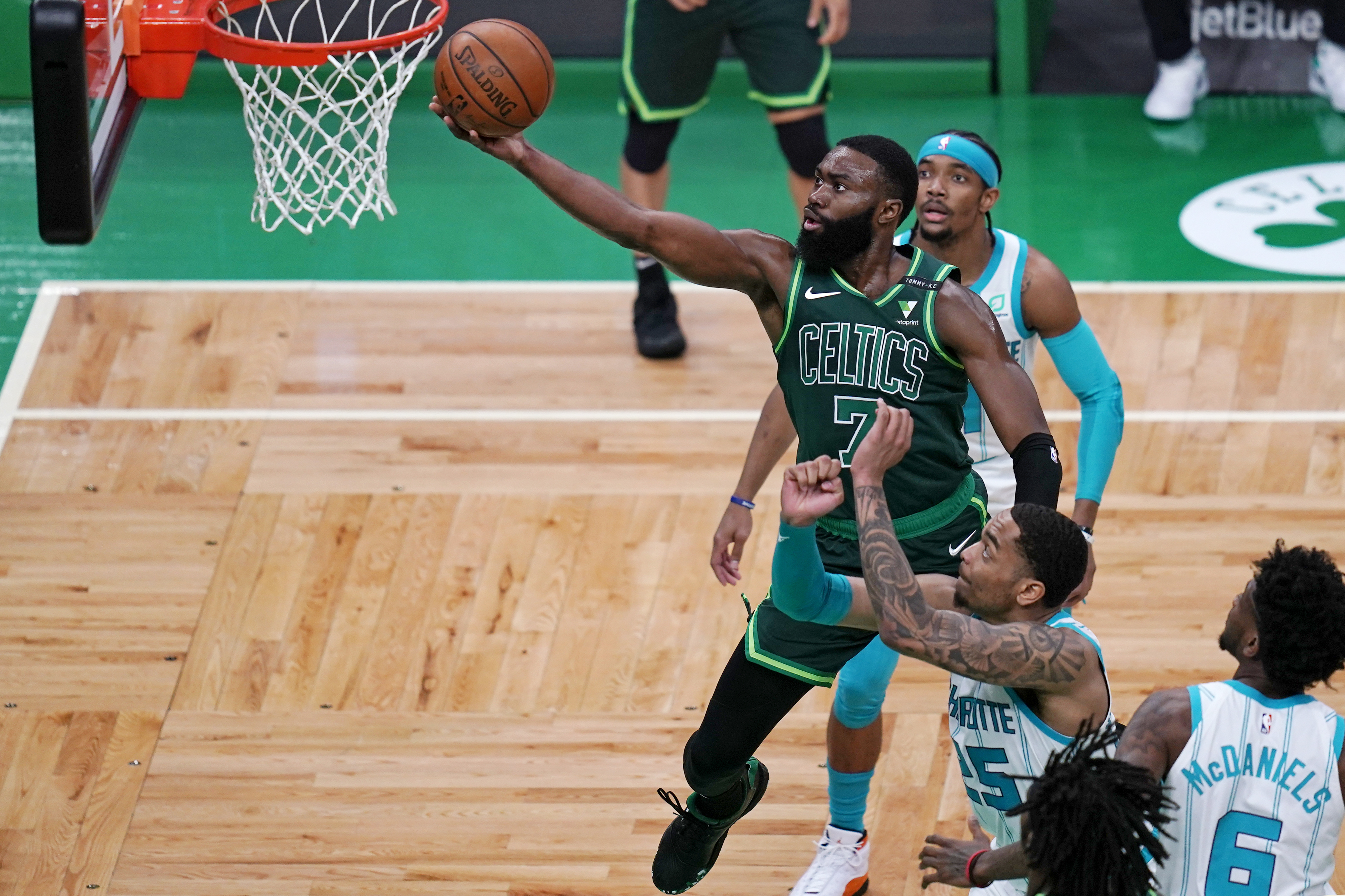 Jaylen Brown, seen here driving to the bucket Wednesday night, had a lot of positive things to say about rookie Aaron Nesmith after the game.
