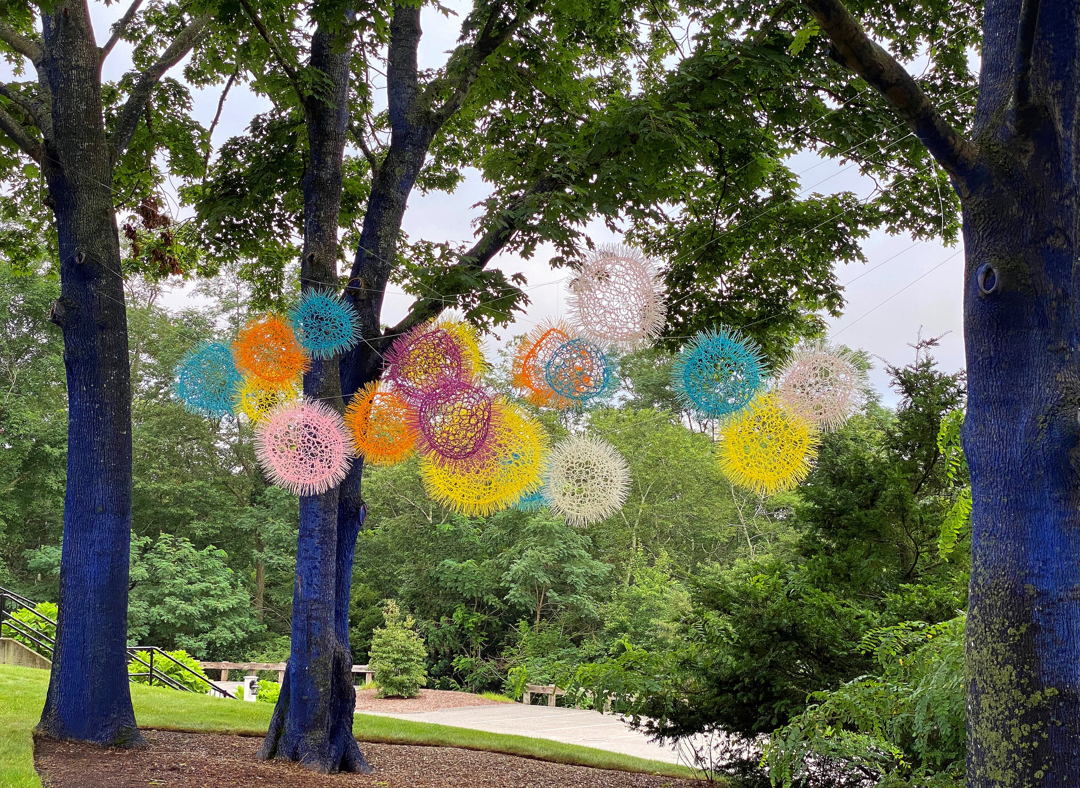 "PomPom" is part of "Floating Imagery," a series of six vibrant sculptures by Sui Park located on the grounds of the Cahoon Museum of American Art in Cotuit and inside its atrium.