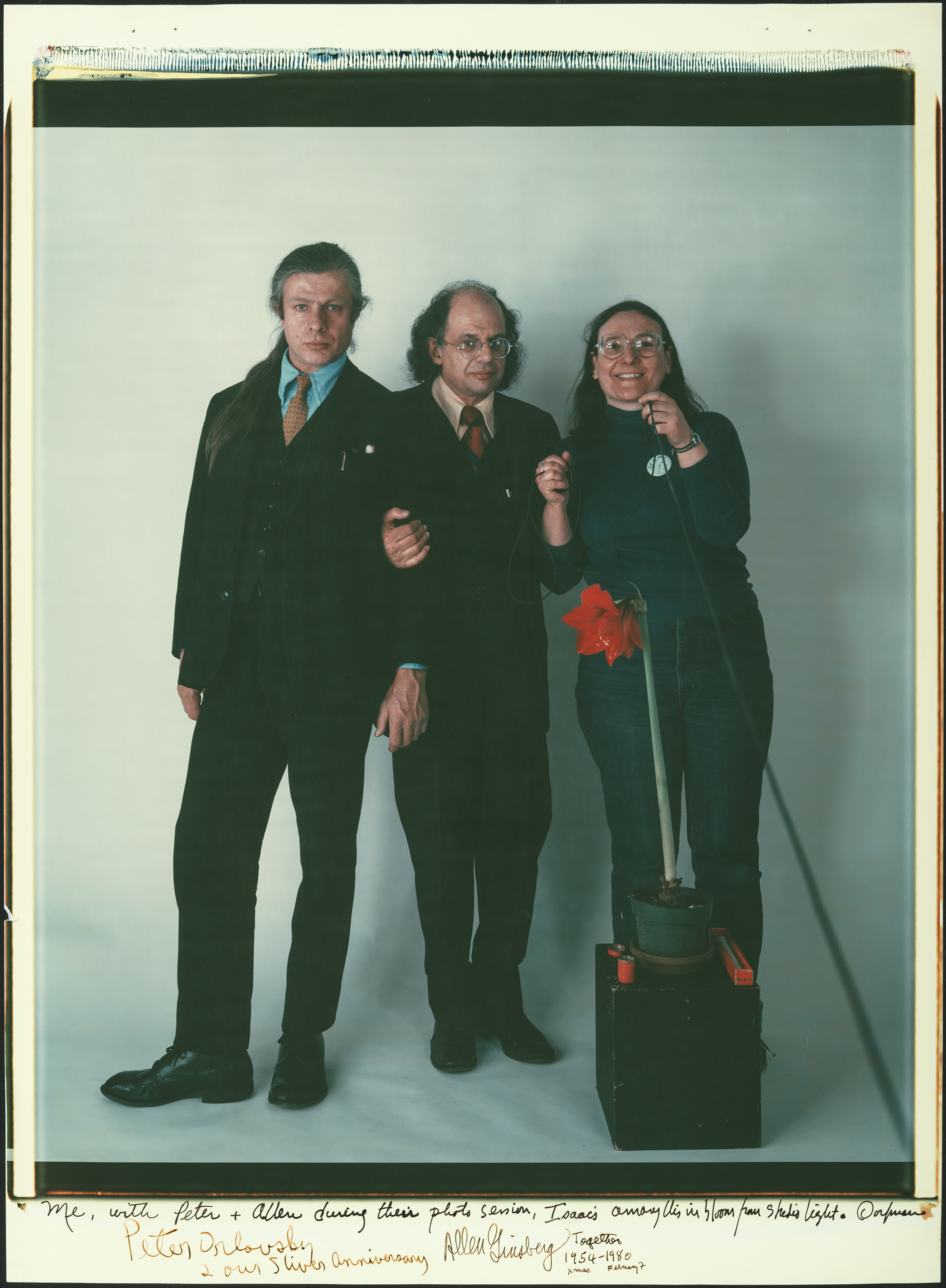 Ms. Dorfman's Polaroid image of her with Peter Orlovsky and Allen Ginsberg.