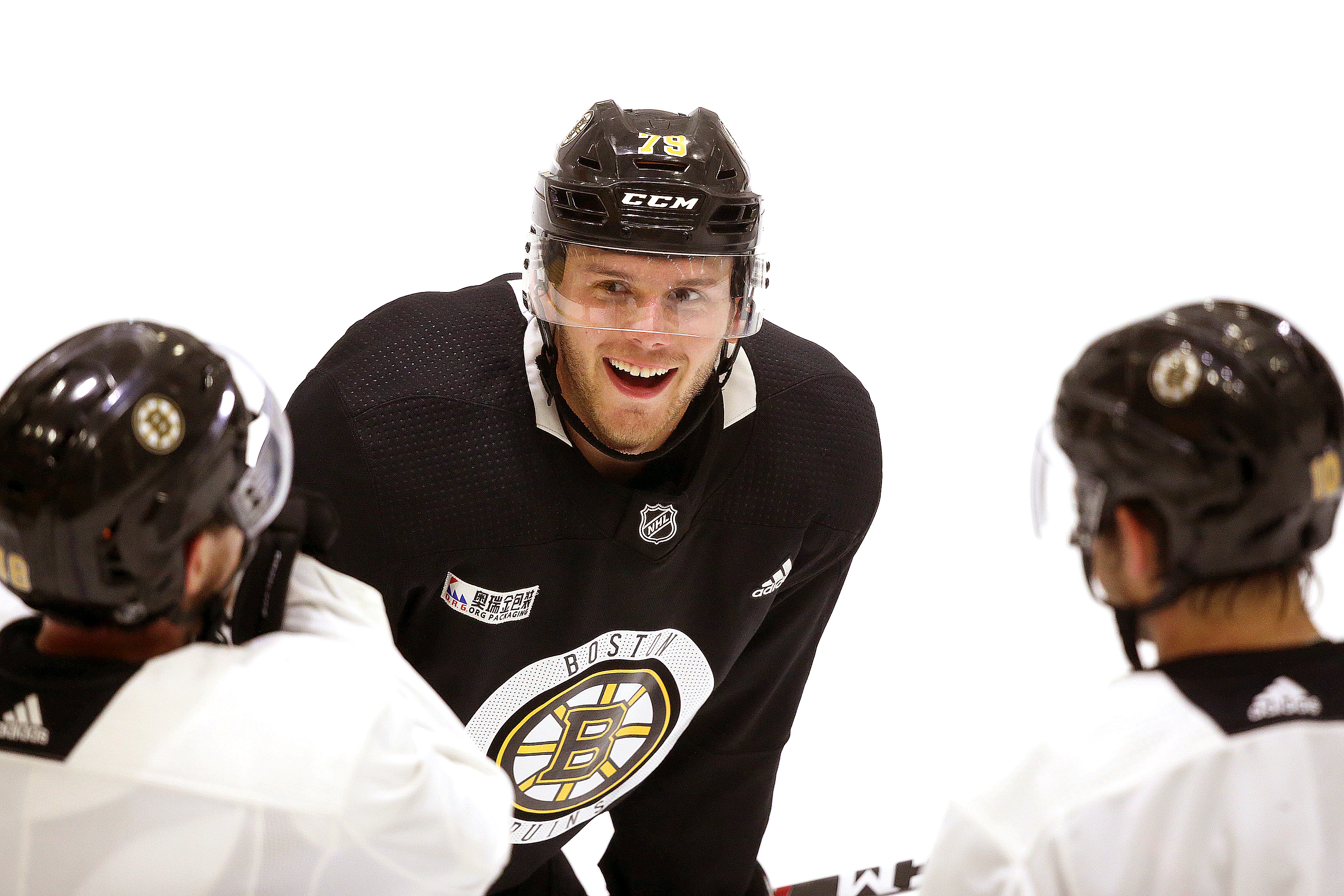 How will the loss of Jeremy Lauzon impact the Bruins' performance along the blue line?