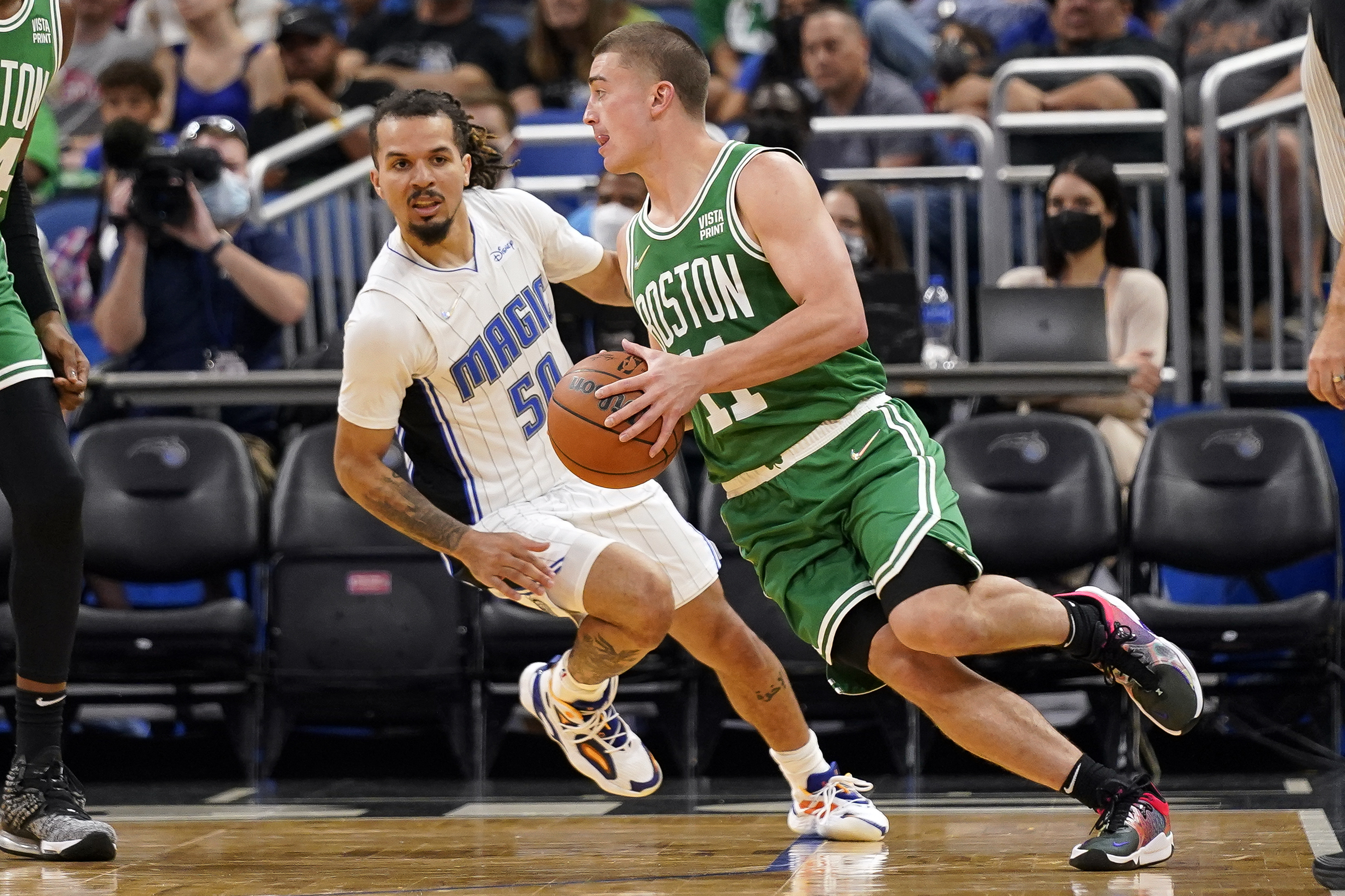Payton Pritchard moves against Orlando's Cole Anthony during the first half of Wednesday's game.