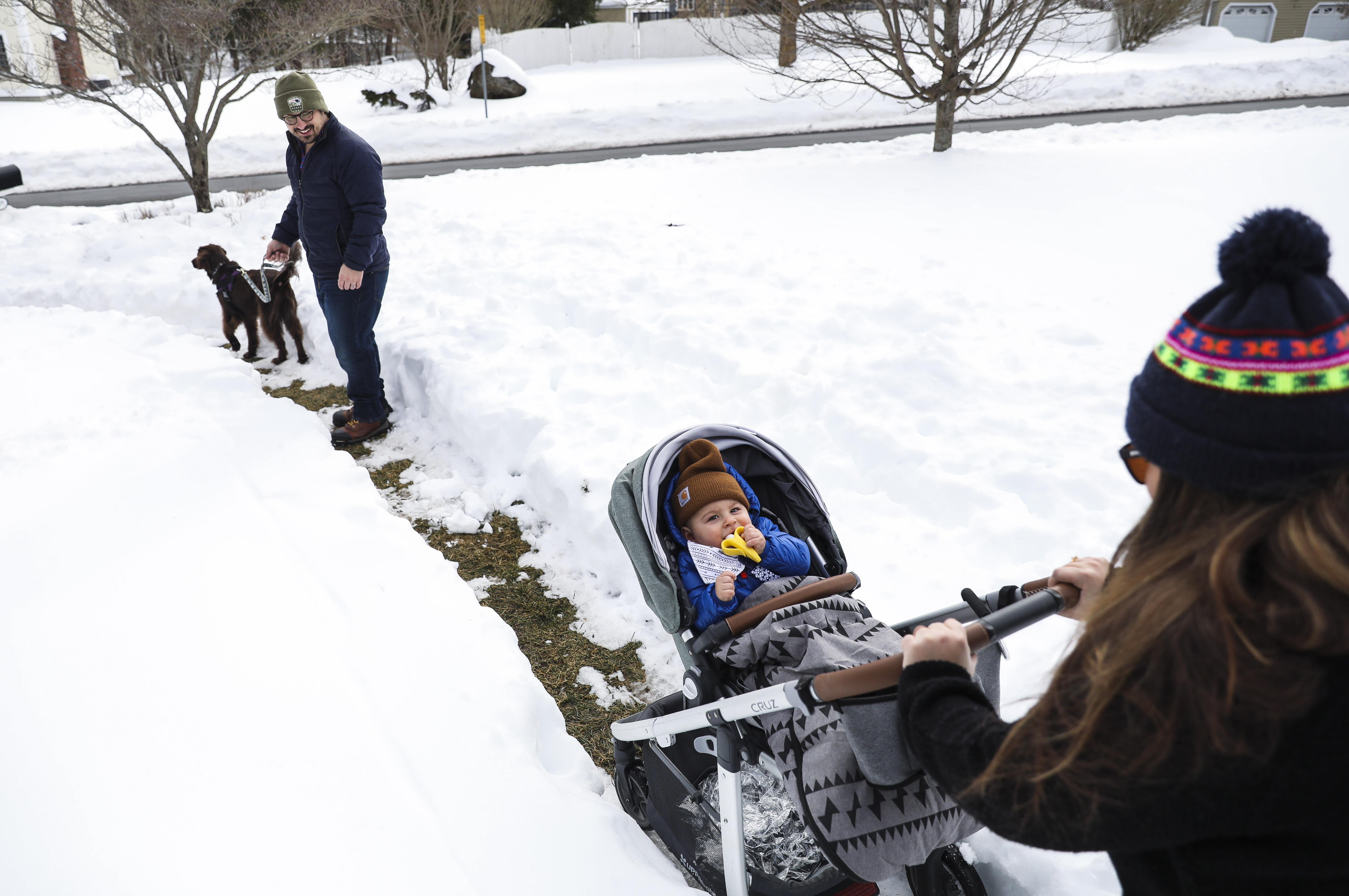 Eric and Alexis Orzeck headed out for a walk with their 8-month-old son Ryder and dog Penny.