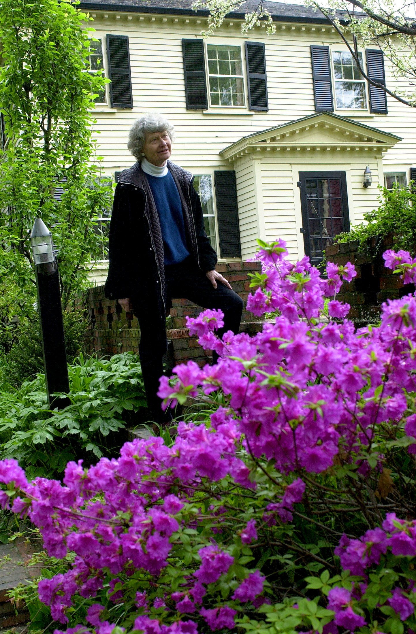 Ms. Johnson, in her garden in Cambridge.