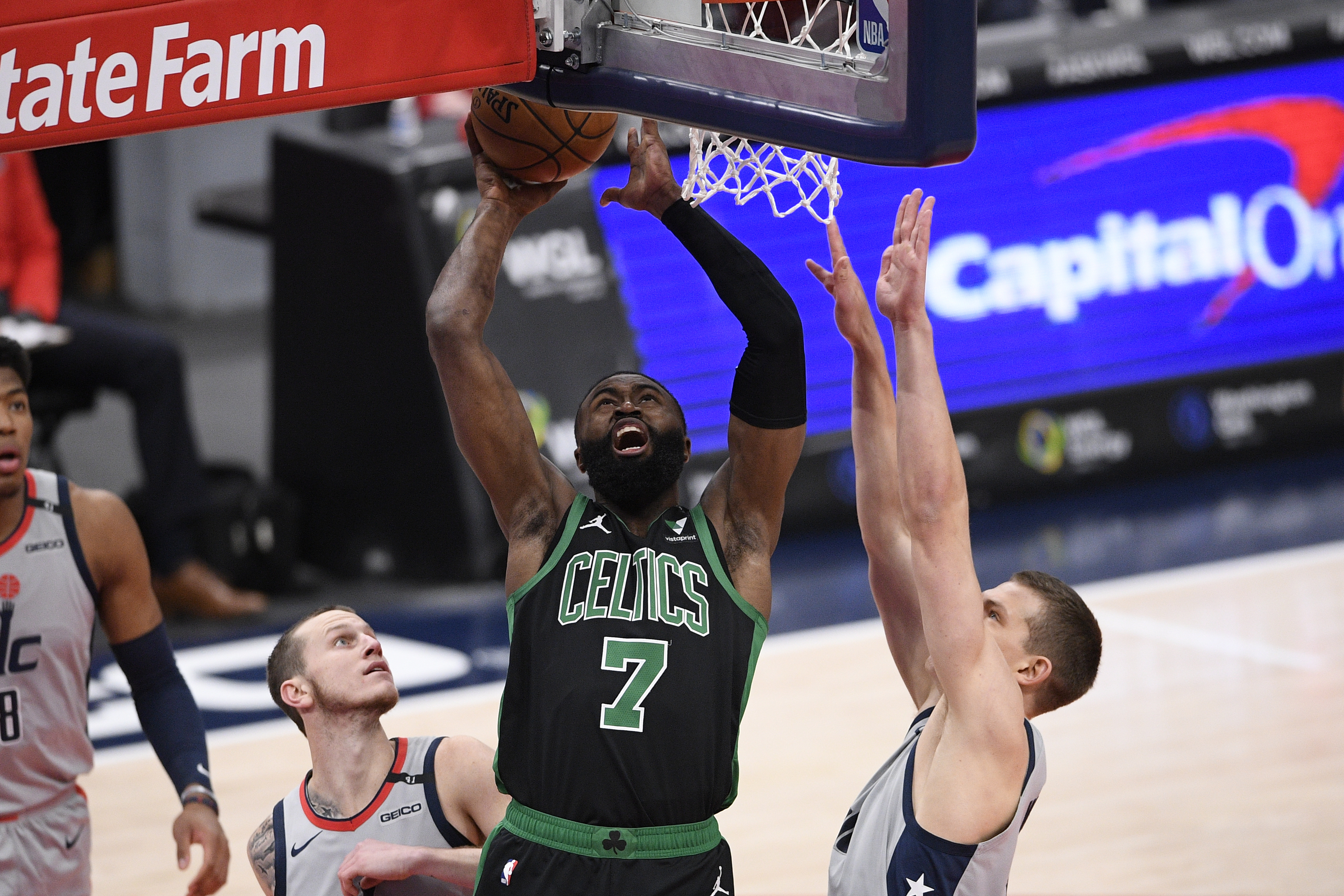 Jaylen Brown goes to the basket during the first half of Sunday's loss to Washington.