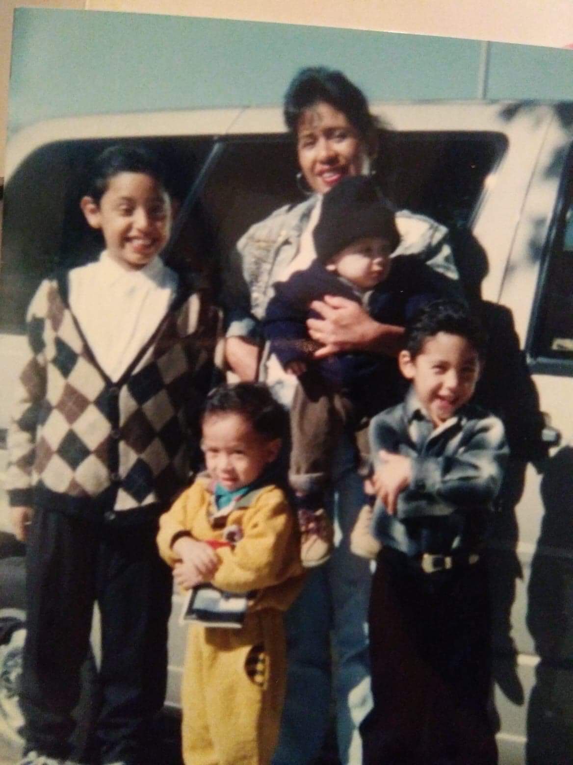 Sara Velasquez, the author’s mother, with her four sons at Griffith Park, Los Angeles, in April 1998. From left: Josue, David, Lester and Ervin.