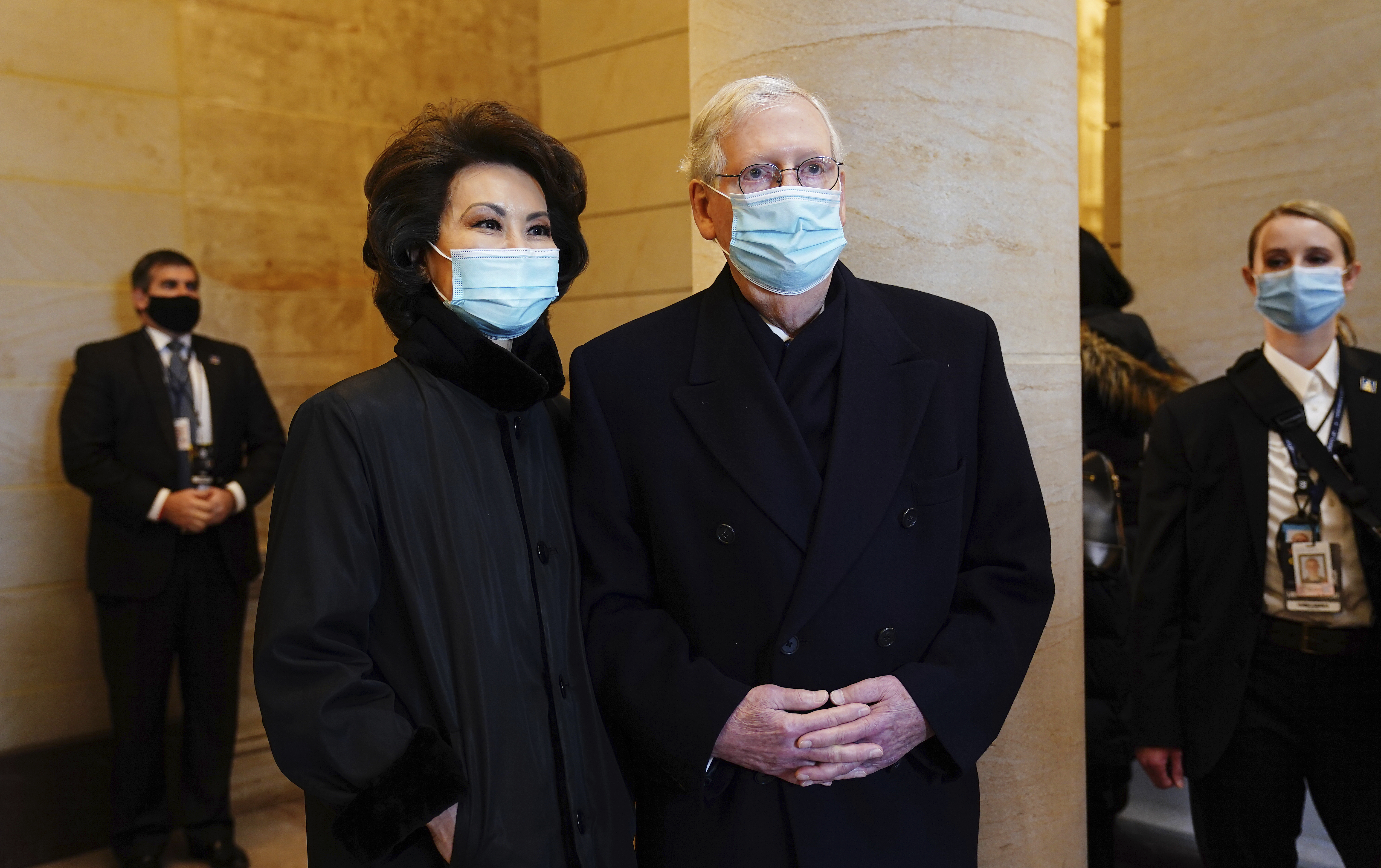 Senate Majority Leader Mitch McConnell, right, and his wife, former secretary of transportation Elaine Chao.