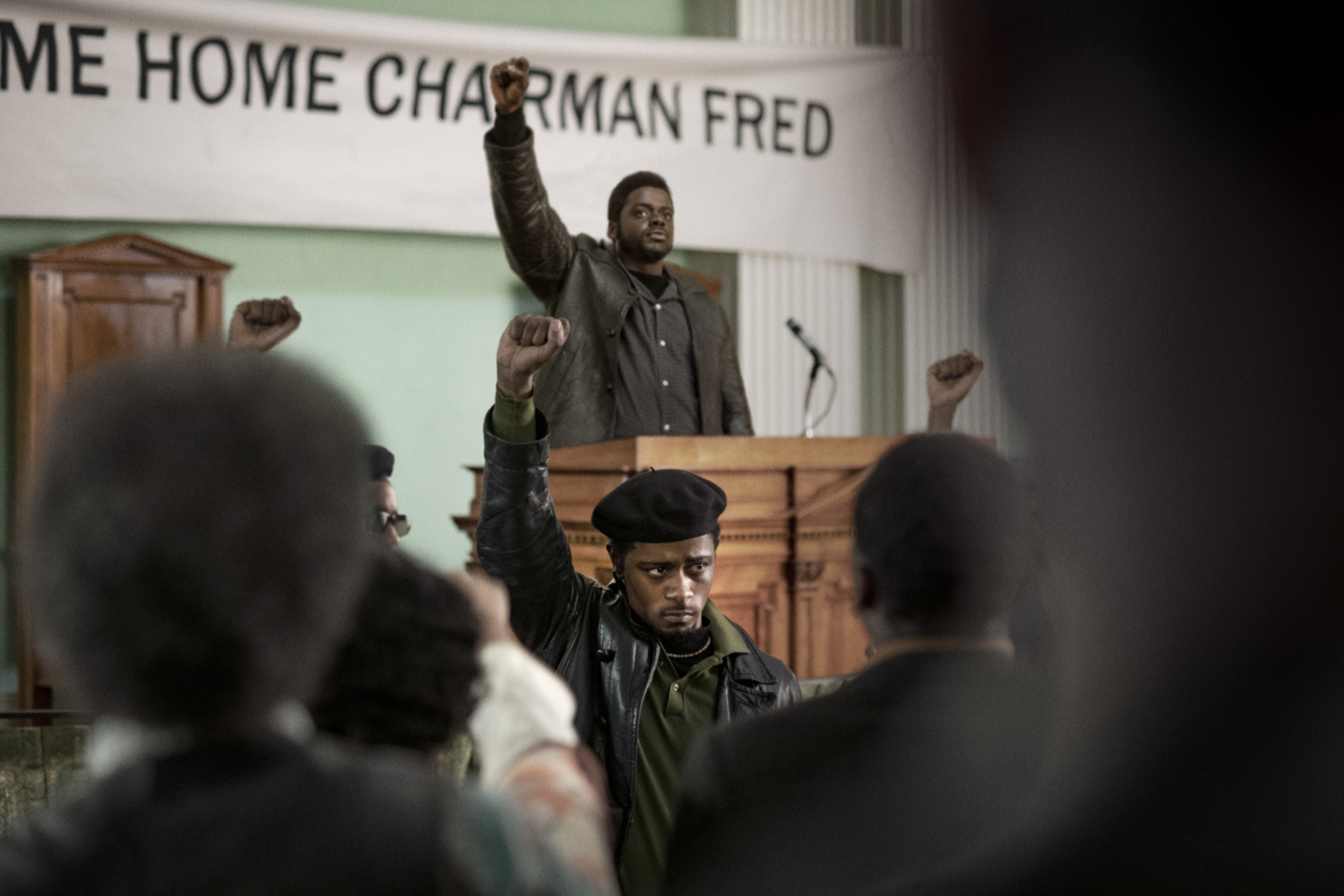 LaKeith Stanfield (in the foreground) with Daniel Kaluuya in a scene from "Judas and the Black Messiah."