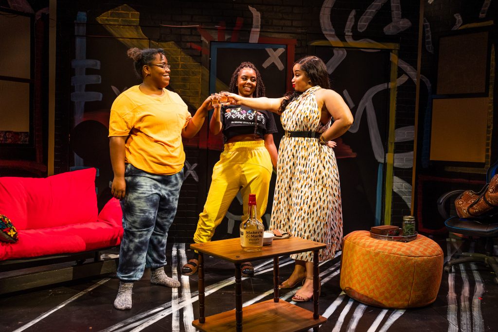 From left: Shanelle Chloe Villegas, Kelsey Fonise, and Thomika Marie Bridwell in "BLKS" at SpeakEasy Stage Company.