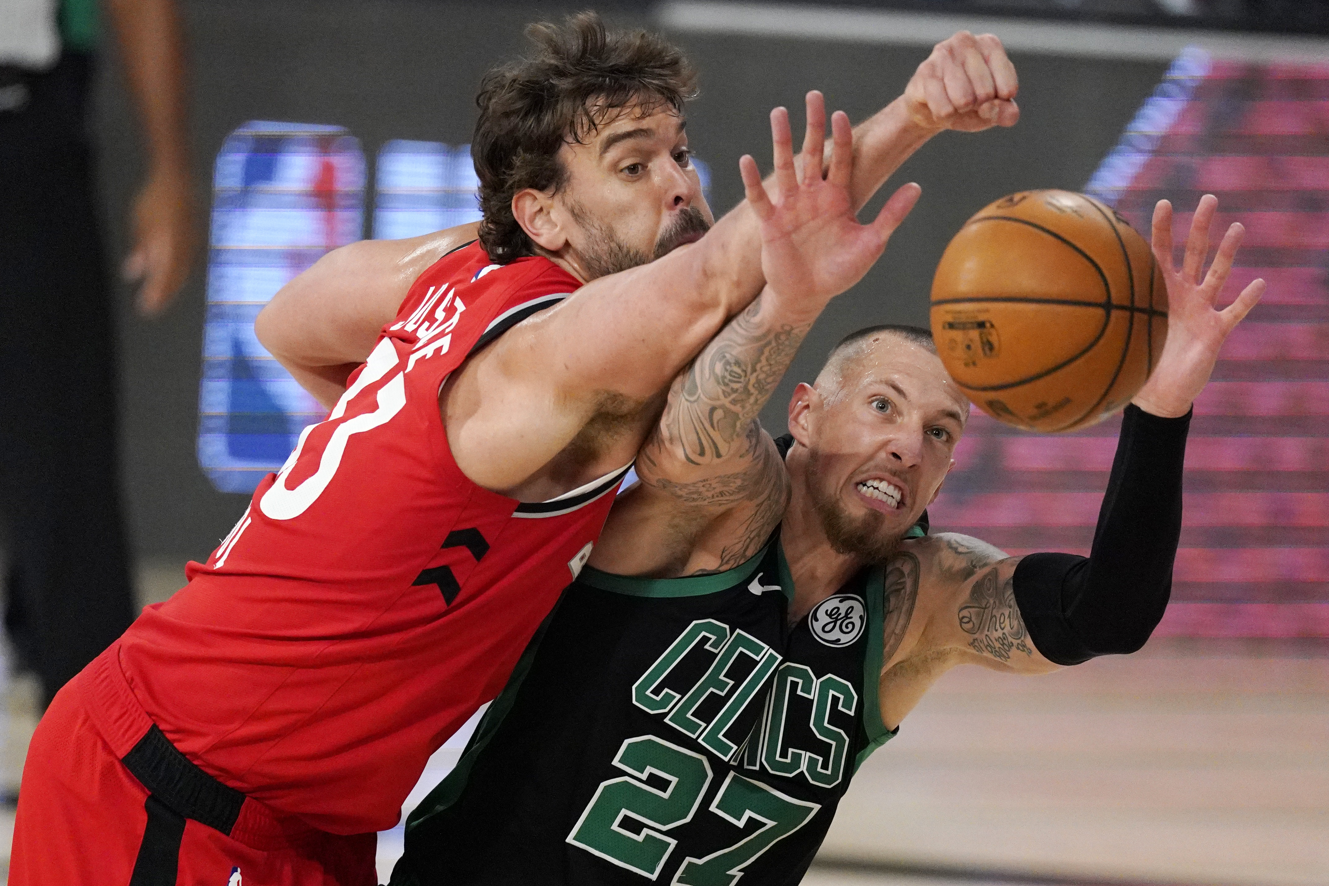 Daniel Theis and Toronto's Marc Gasol battle for a rebound during the second half of Monday's game.