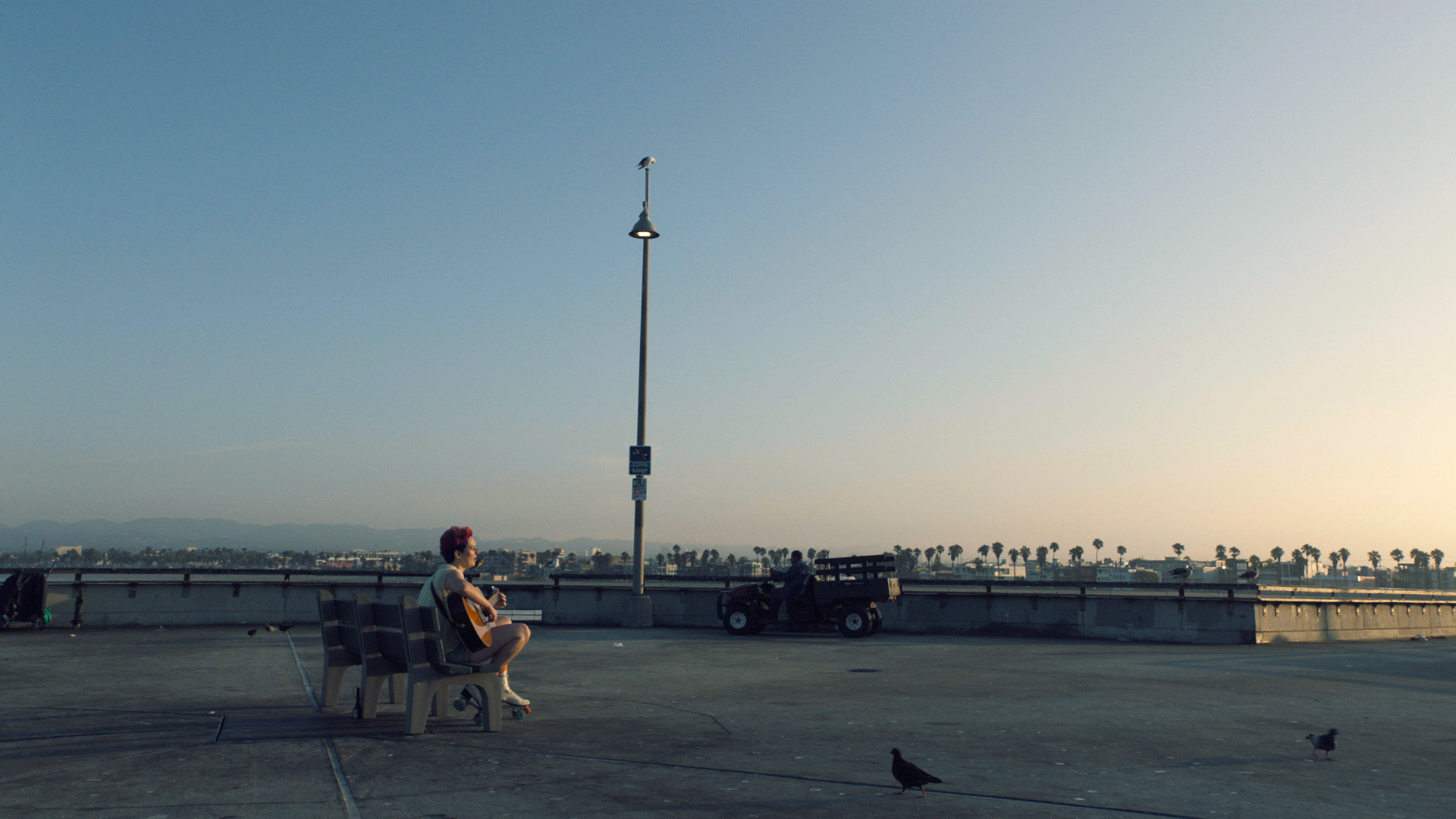 Olympia Miccio plays the guitar in the opening scene of the feature film "Summertime."