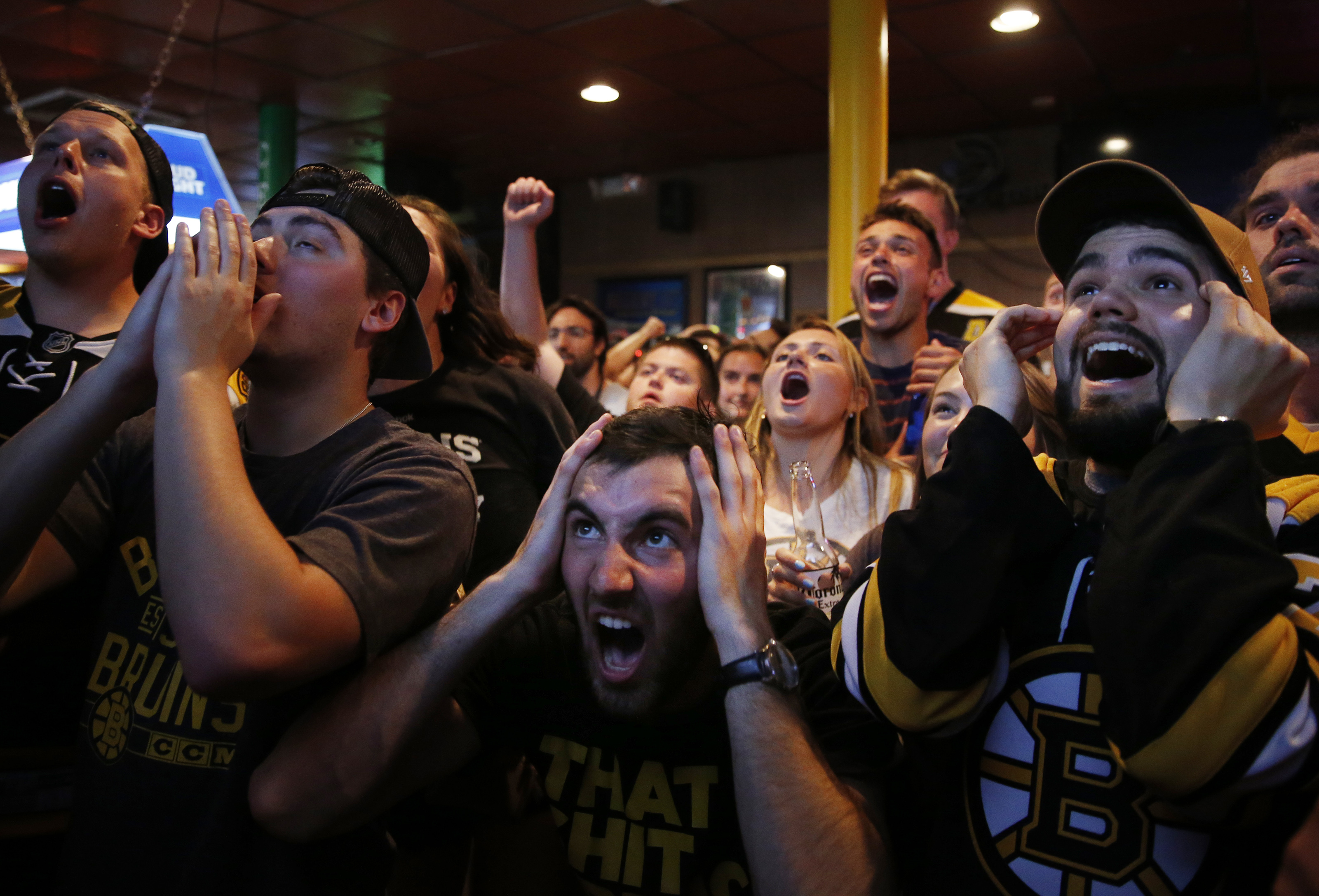 Bruins fans at Sullivan’s Tap in Boston reacted after a missed shot during Game 7 of the Stanley Cup Final.