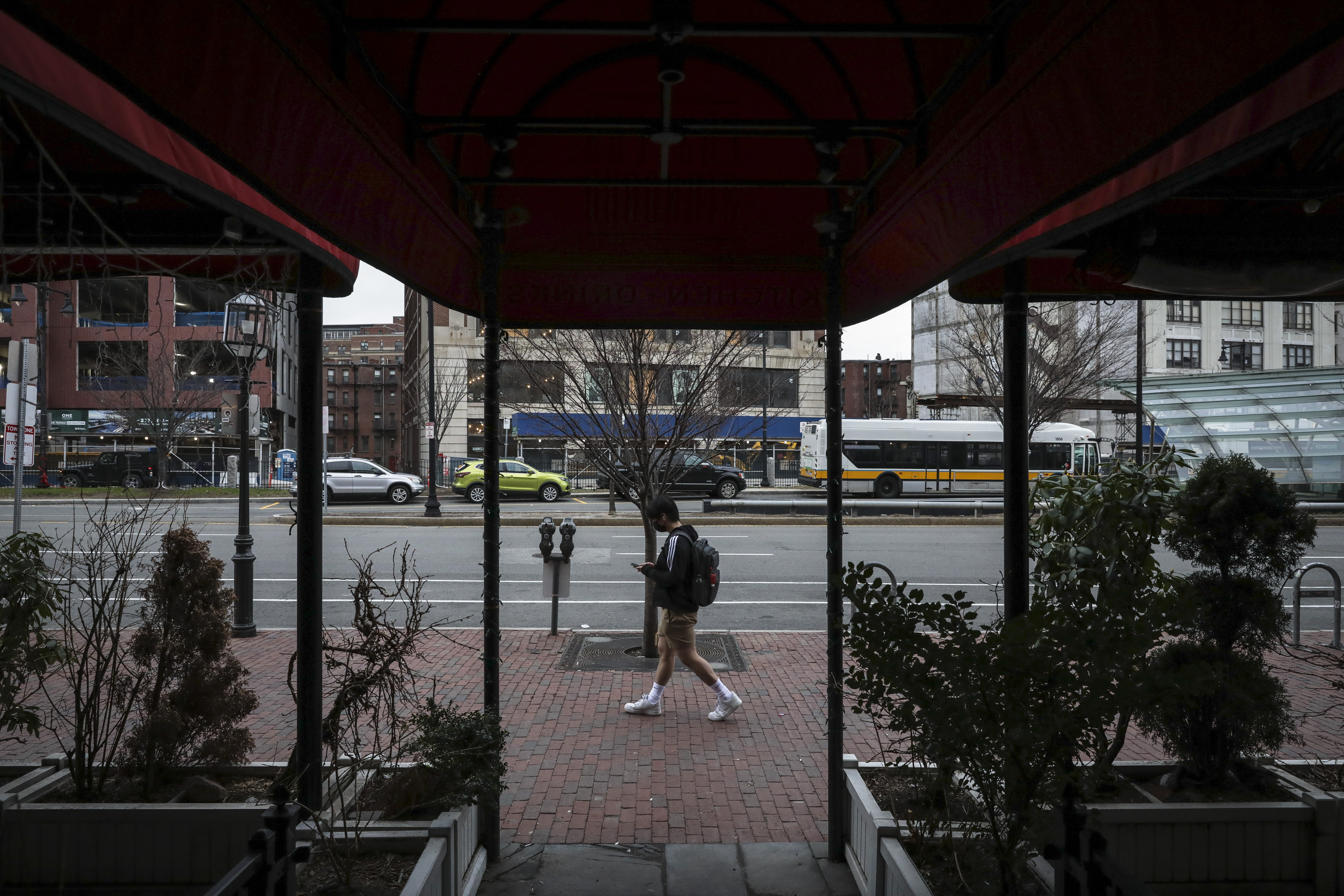 The patio of the shuttered Eastern Standard remains empty, with overgrown planters at the once-popular restaurant in Kenmore Square.