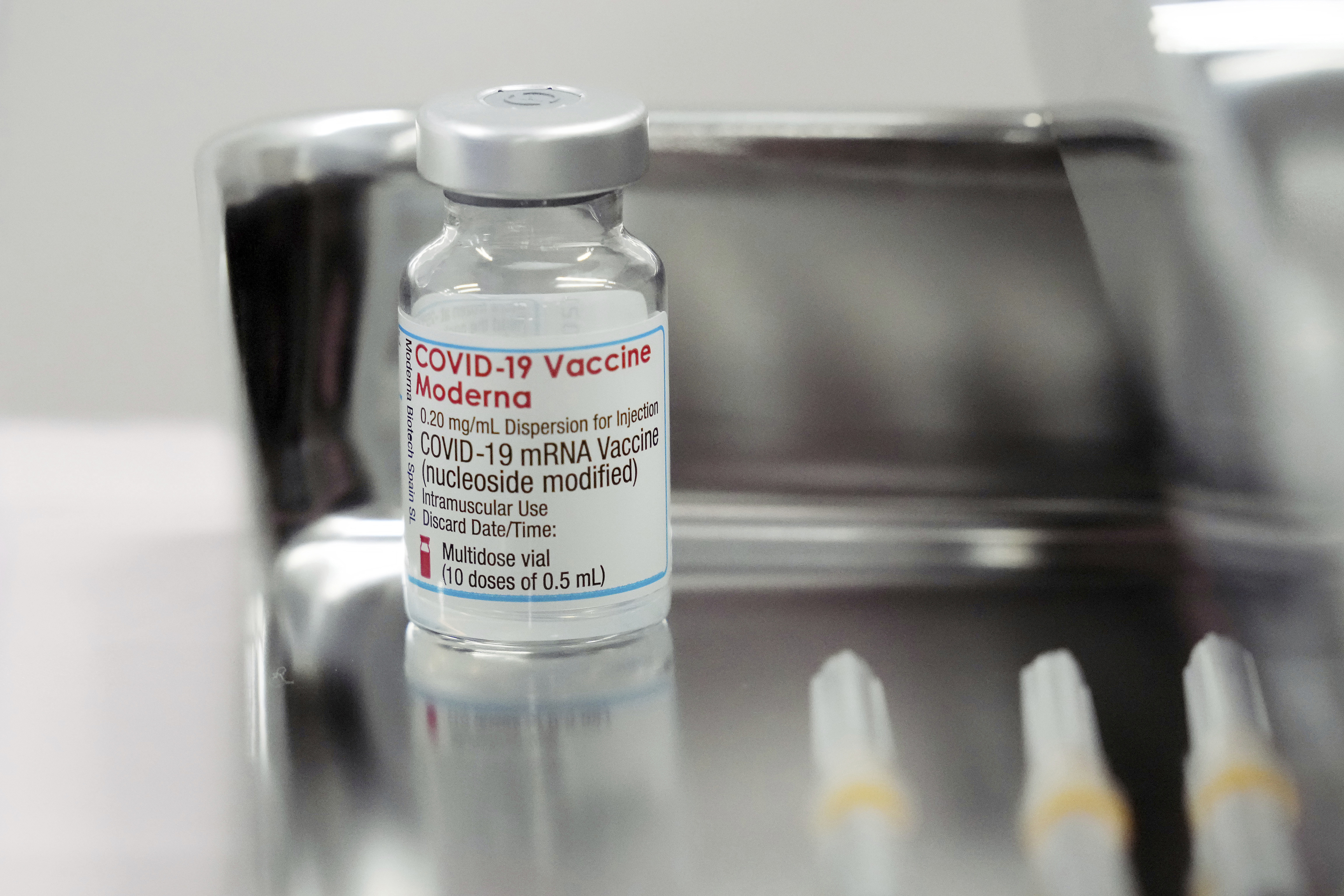 A Moderna COVID-19 vaccine vial.