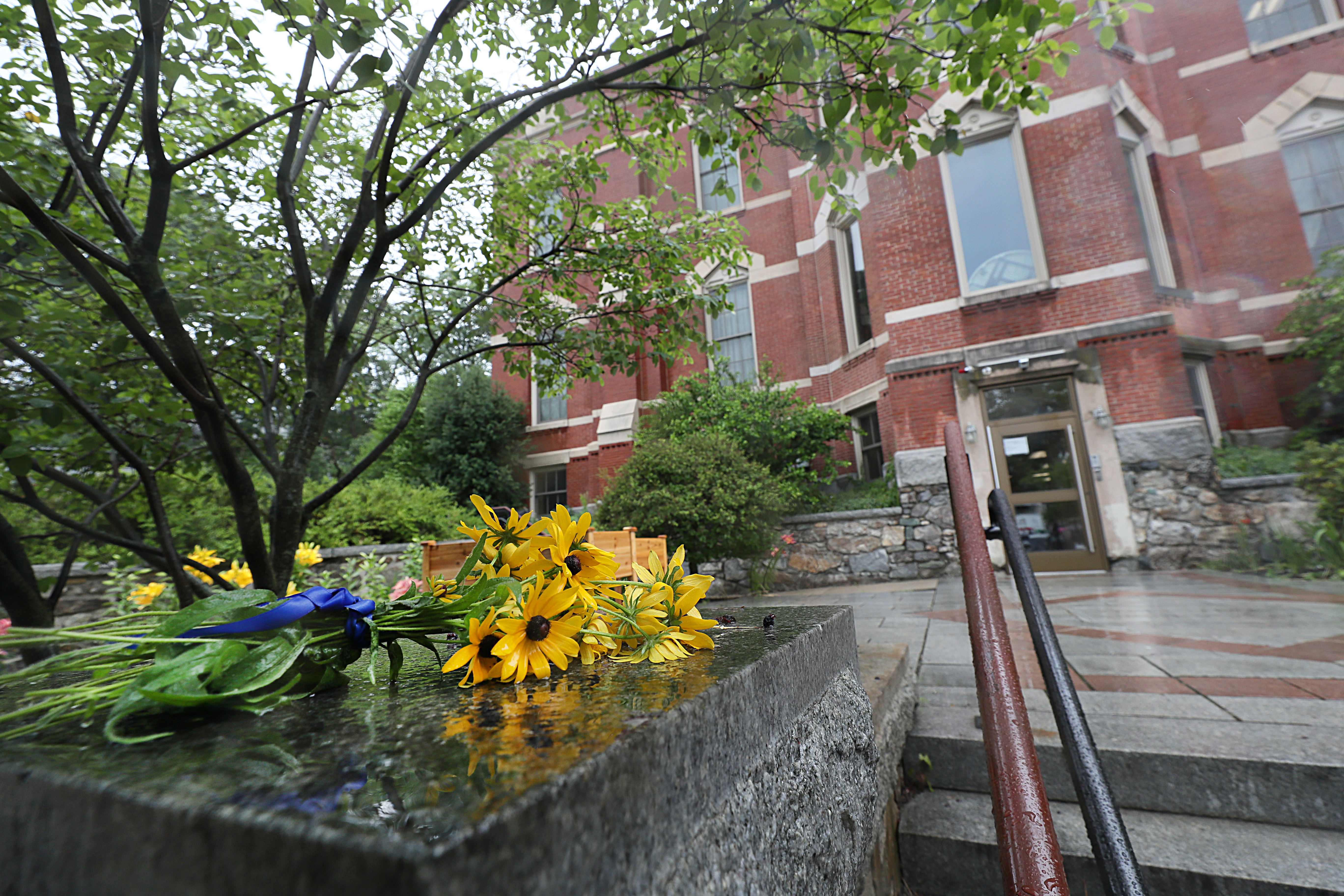 Flowers were placed in front of the Shaloh House, a Jewish day school in Brighton.