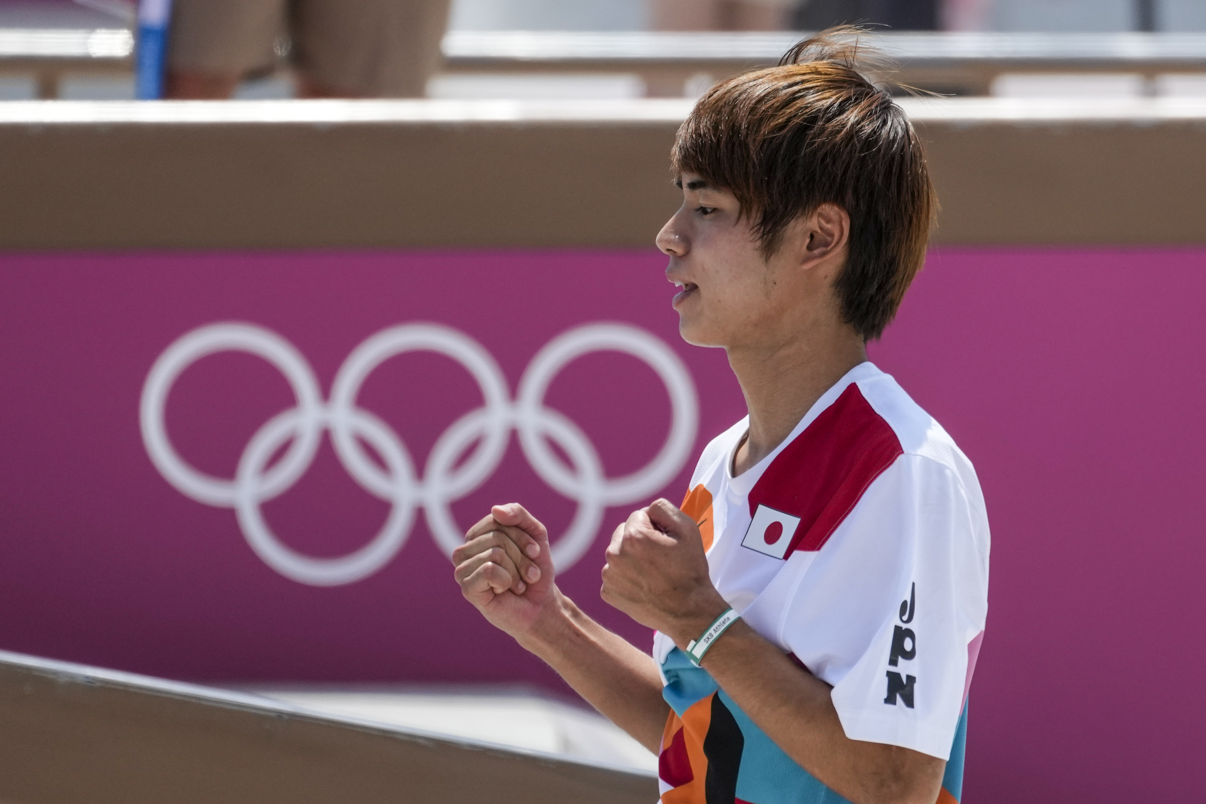 Yuto Horigome of Japan celebrates after competing in men's street skateboarding.