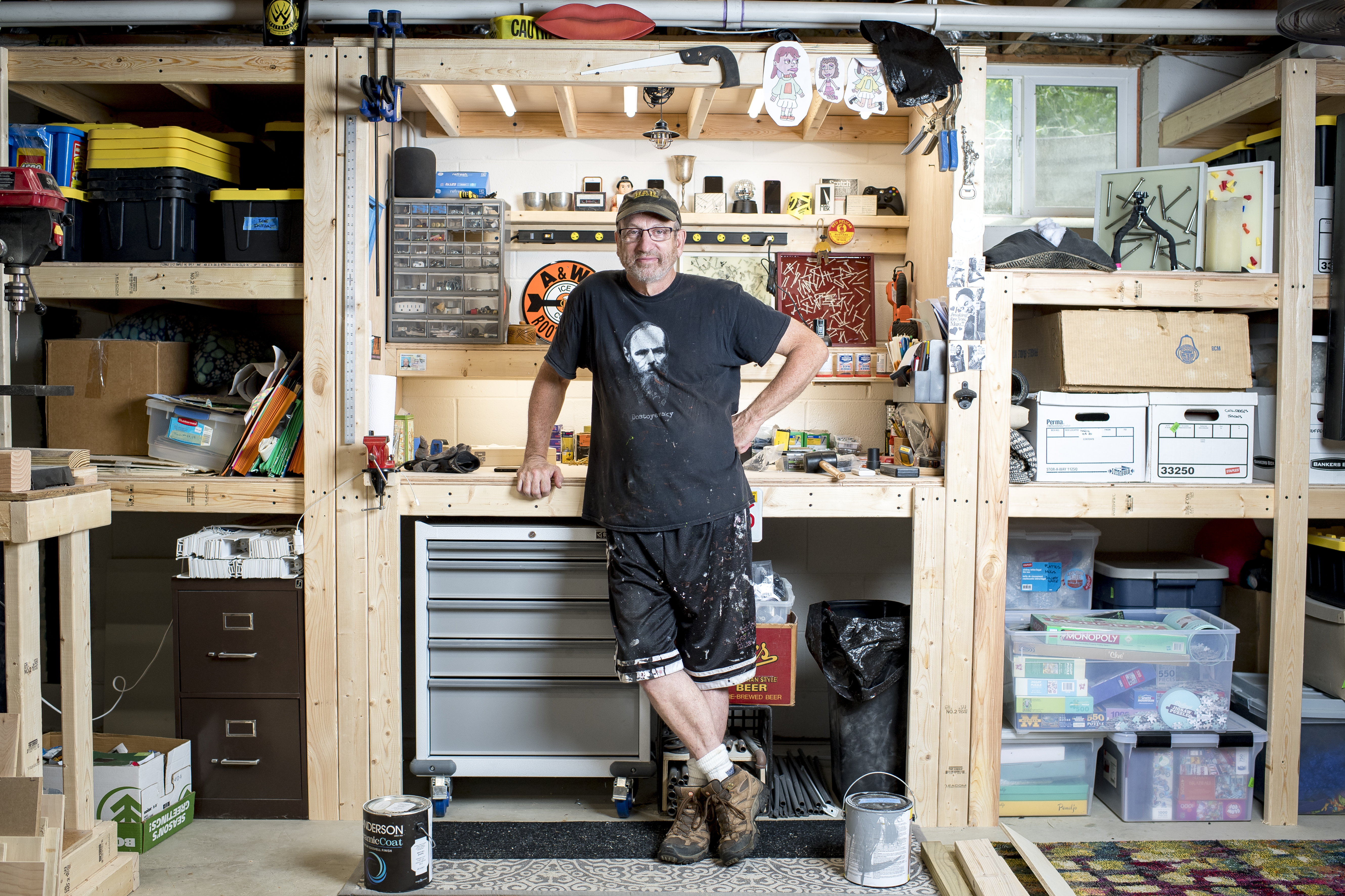 John Schumacher stood in his basement workshop at his home in Ann Arbor, Mich. Schumacher spent his career working as a middle school teacher in Hanover, Mass., until he retired early to move back to his home state of Michigan in December 2020. 