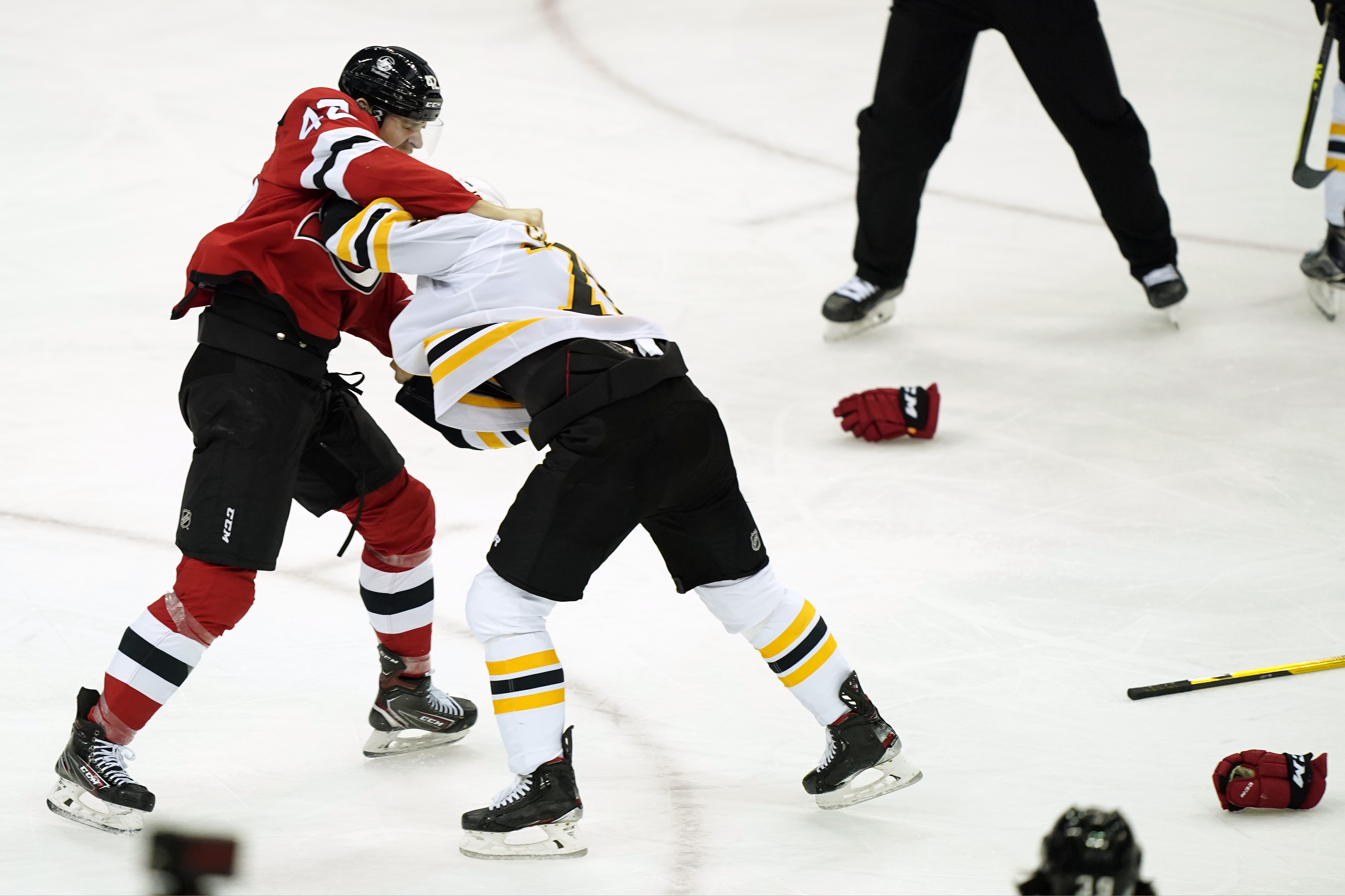 Connor Clifton got into his second fight of the season Monday when he went at it with New Jersey's A.J. Greer in the third period.