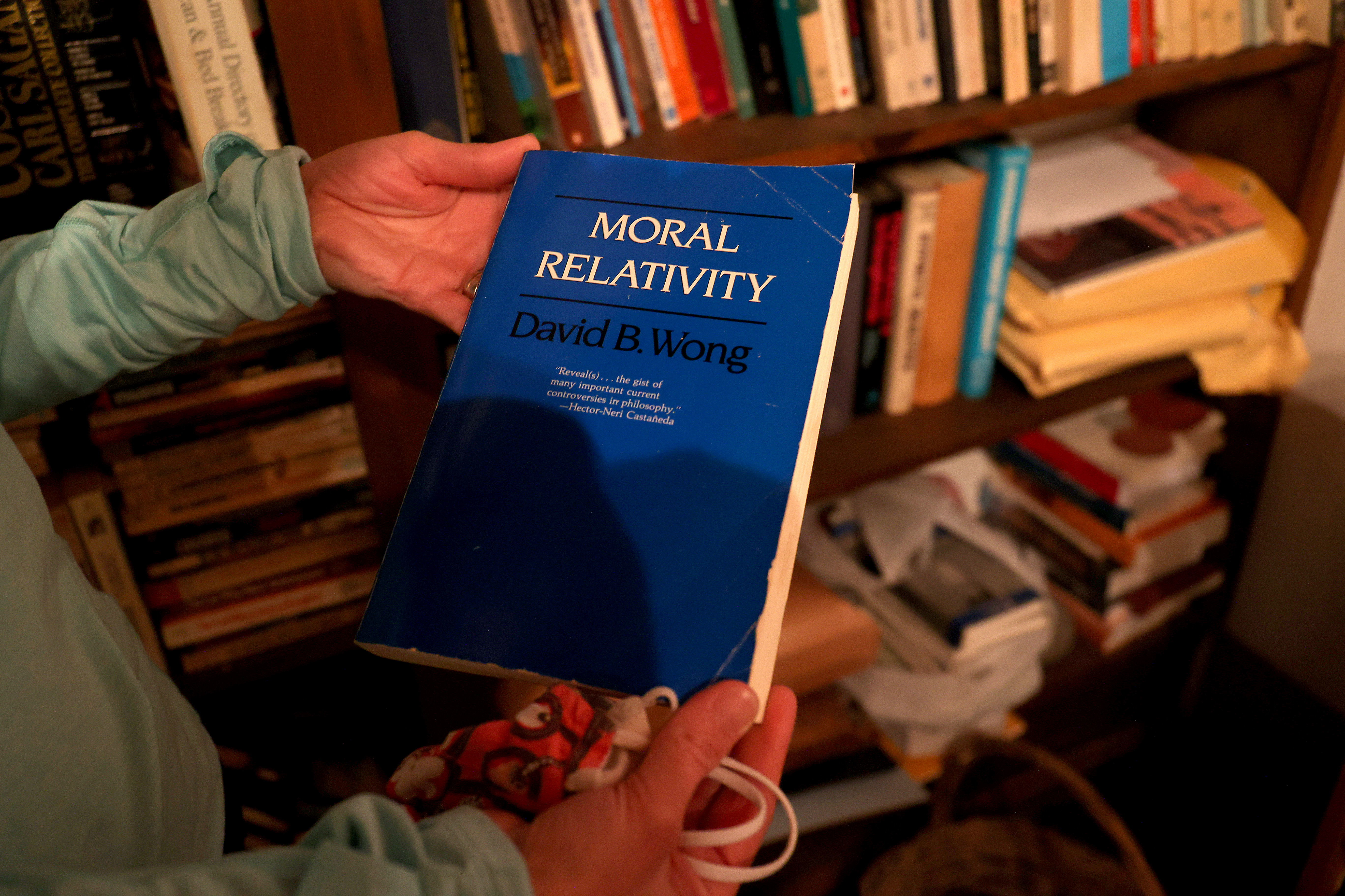 Owners Cory and Jennifer Heinzen say they saw this book inexplicably fall off a shelf twice.