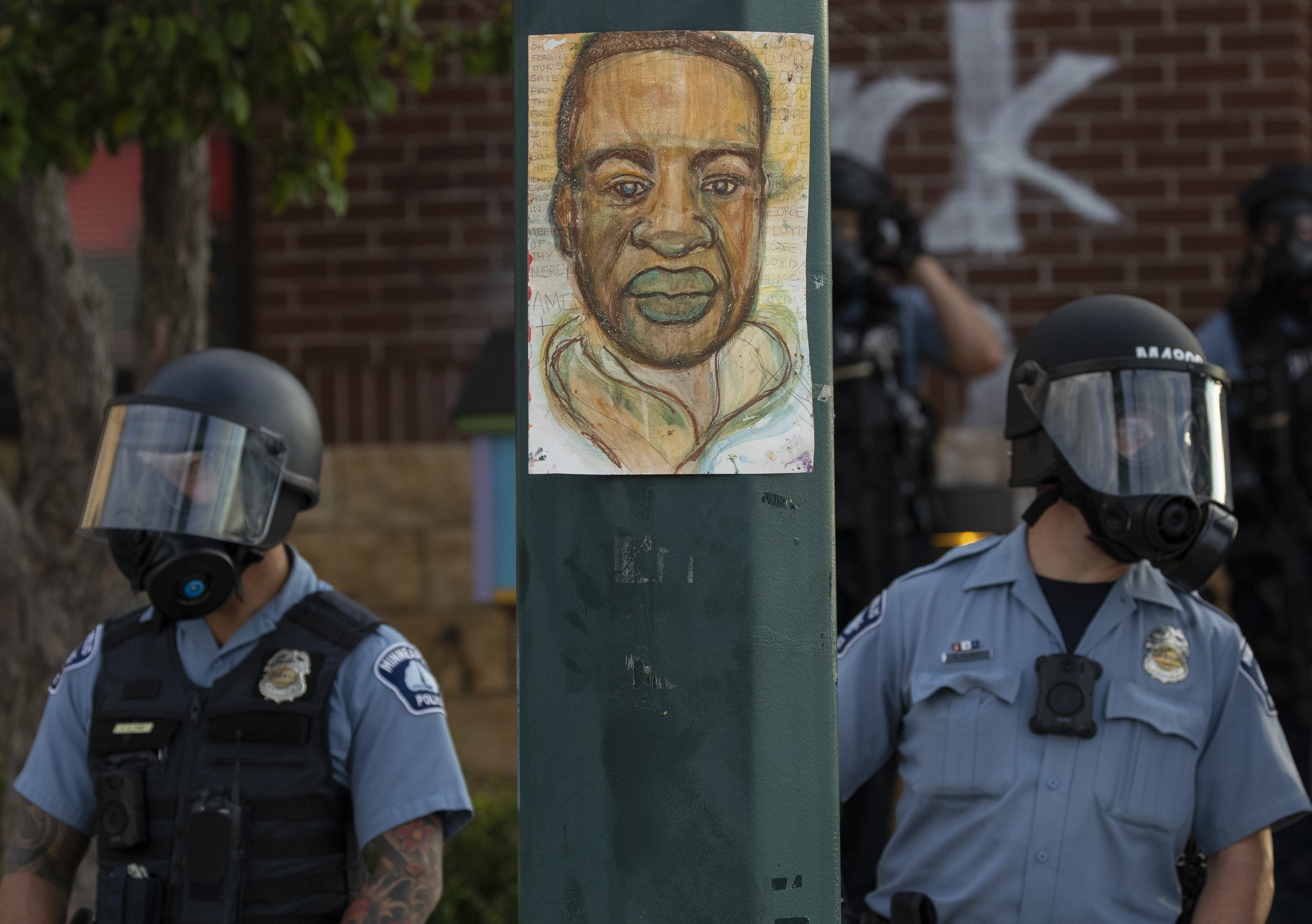 Minnesota police stood outside the department's 3rd Precinct on Wednesday.