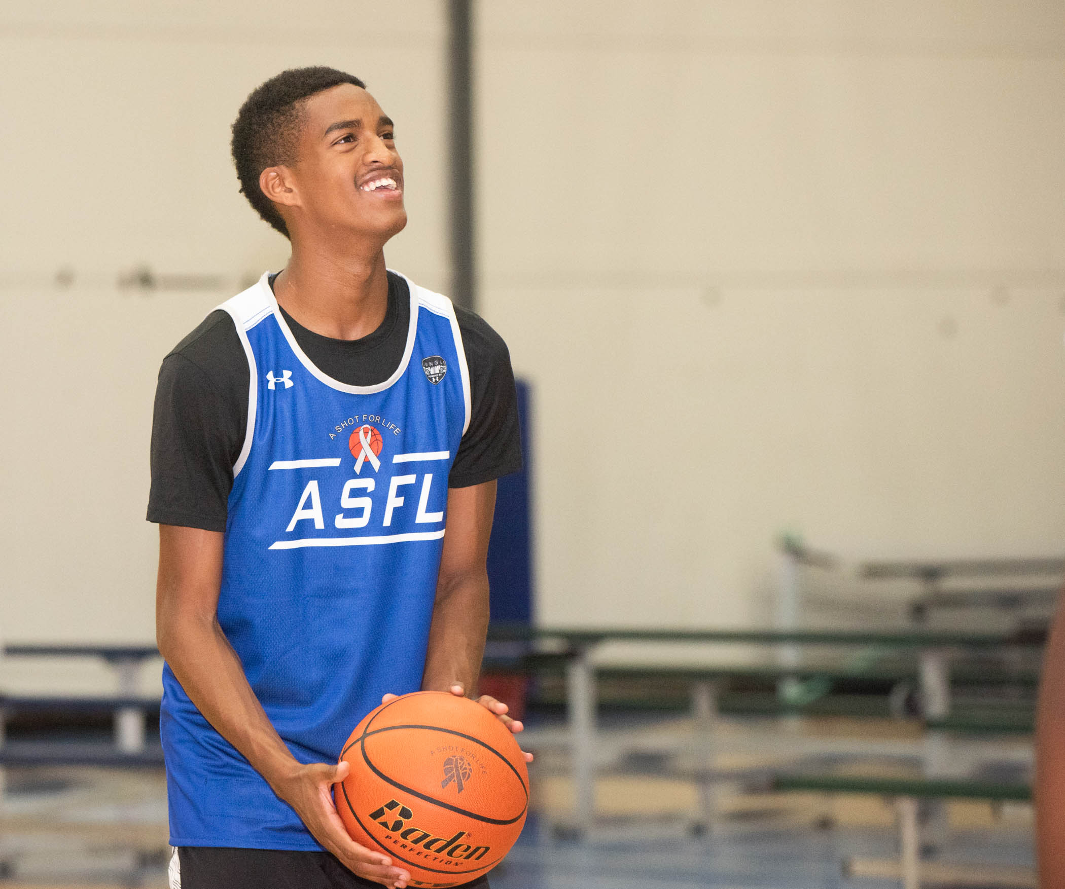 Aaron Cooley, a Massachusetts player heading to Brown University in the fall, prepares to shoot.