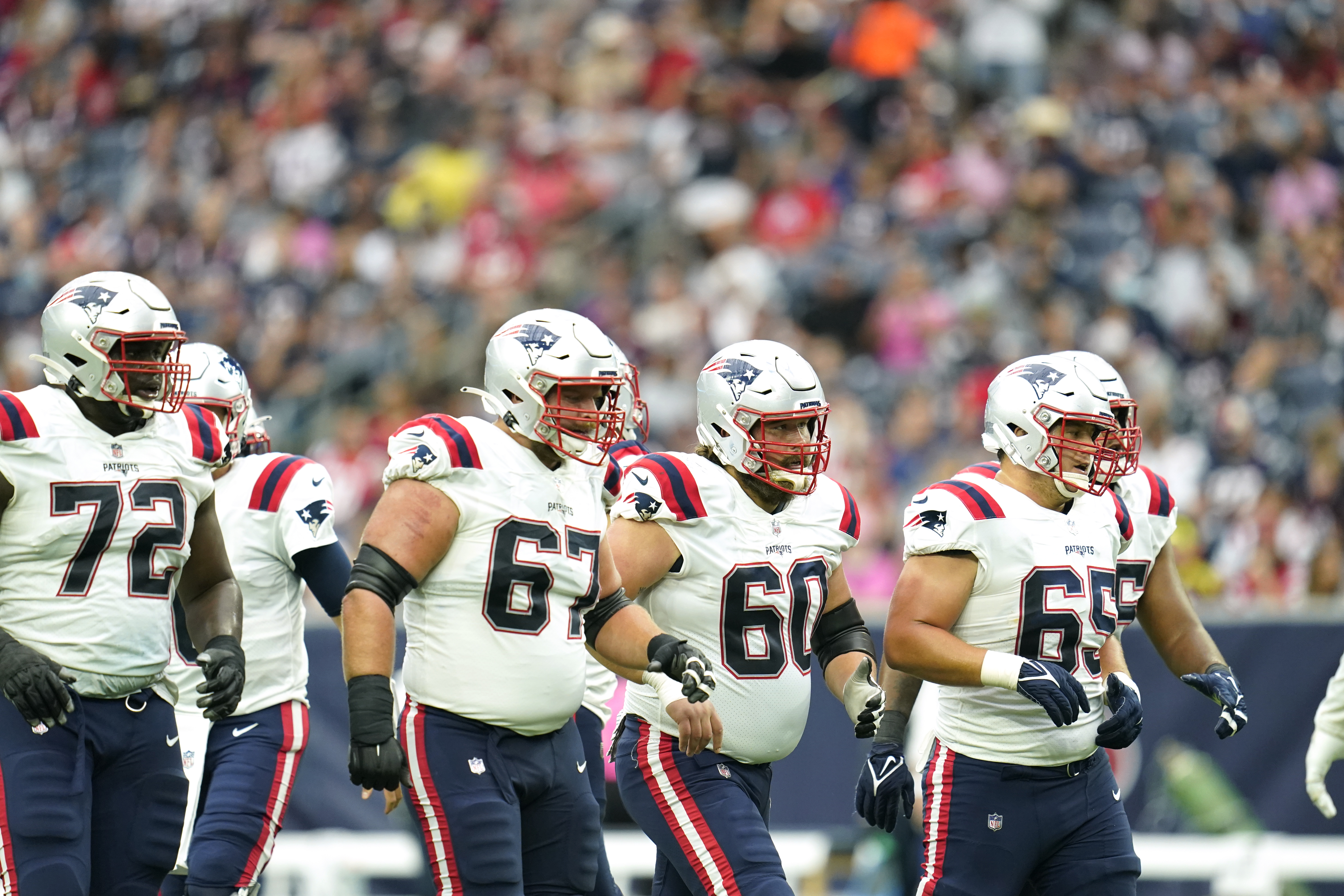 New England's makeshift offensive line, including David Andrews (60), Ted Karras (67), Yodny Cajuste (72), and James Ferentz (65), did well to keep Mac Jones as clean as possible on Sunday.