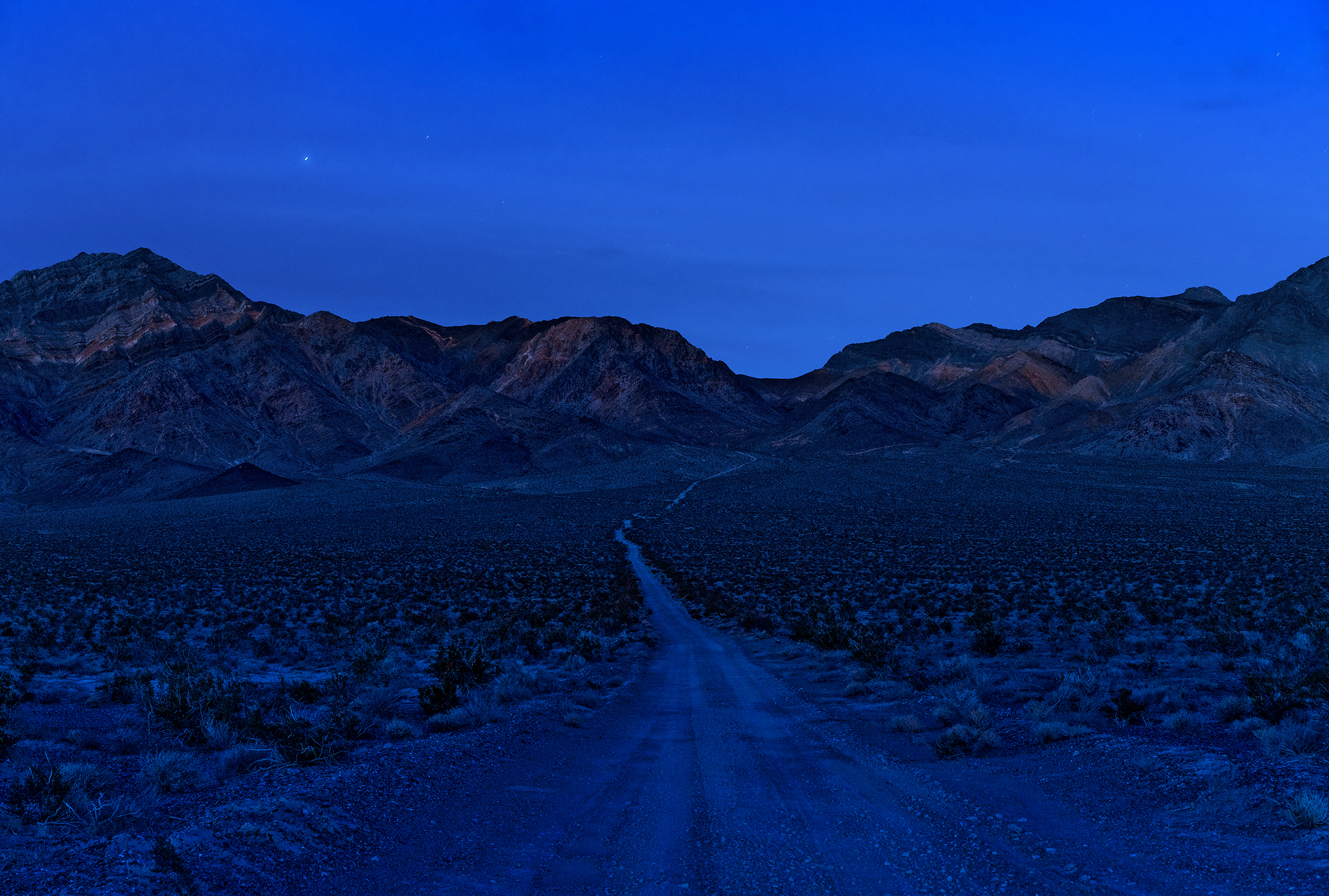 Sim Chi Yin, "Mountain range surrounding the Nevada Test Site, November 2017." From the series "Most People Were Silent."