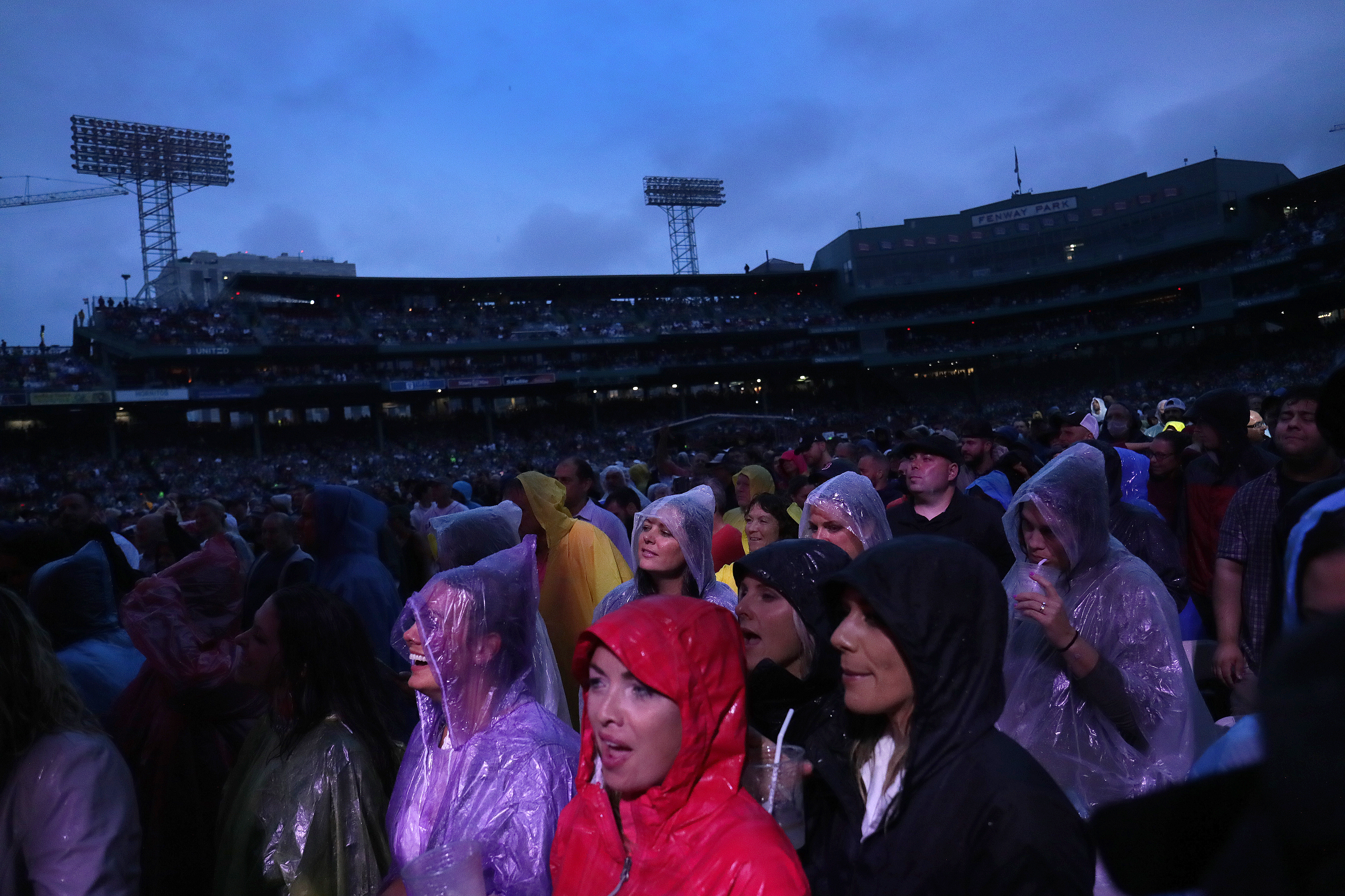 Rain fell as Billy Joel performed at Fenway Park.
