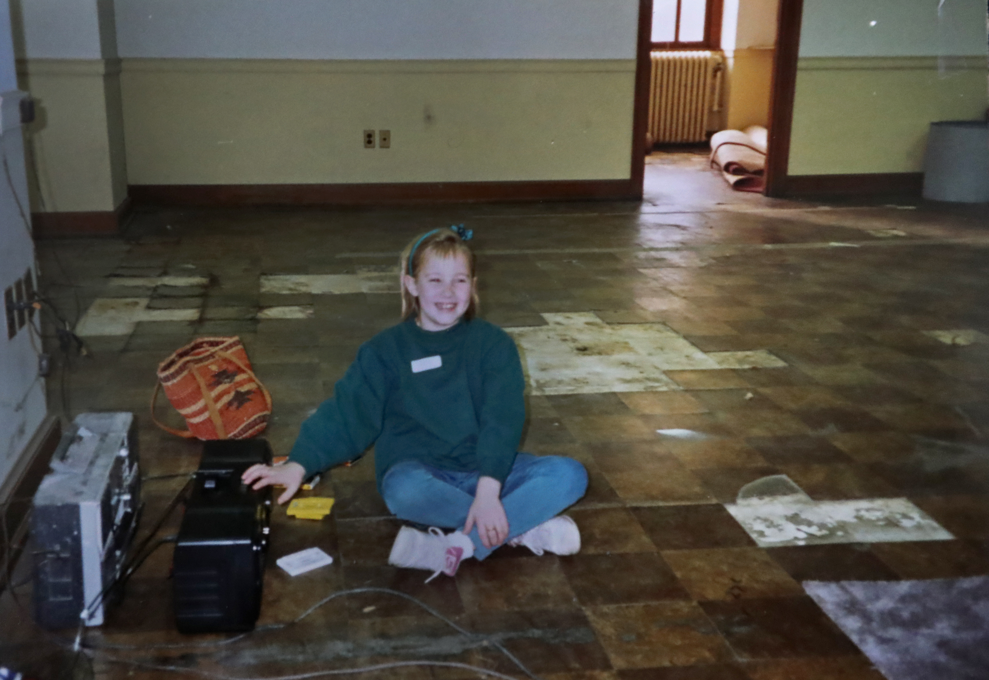A photo of Amy as a child in the office that she now runs.