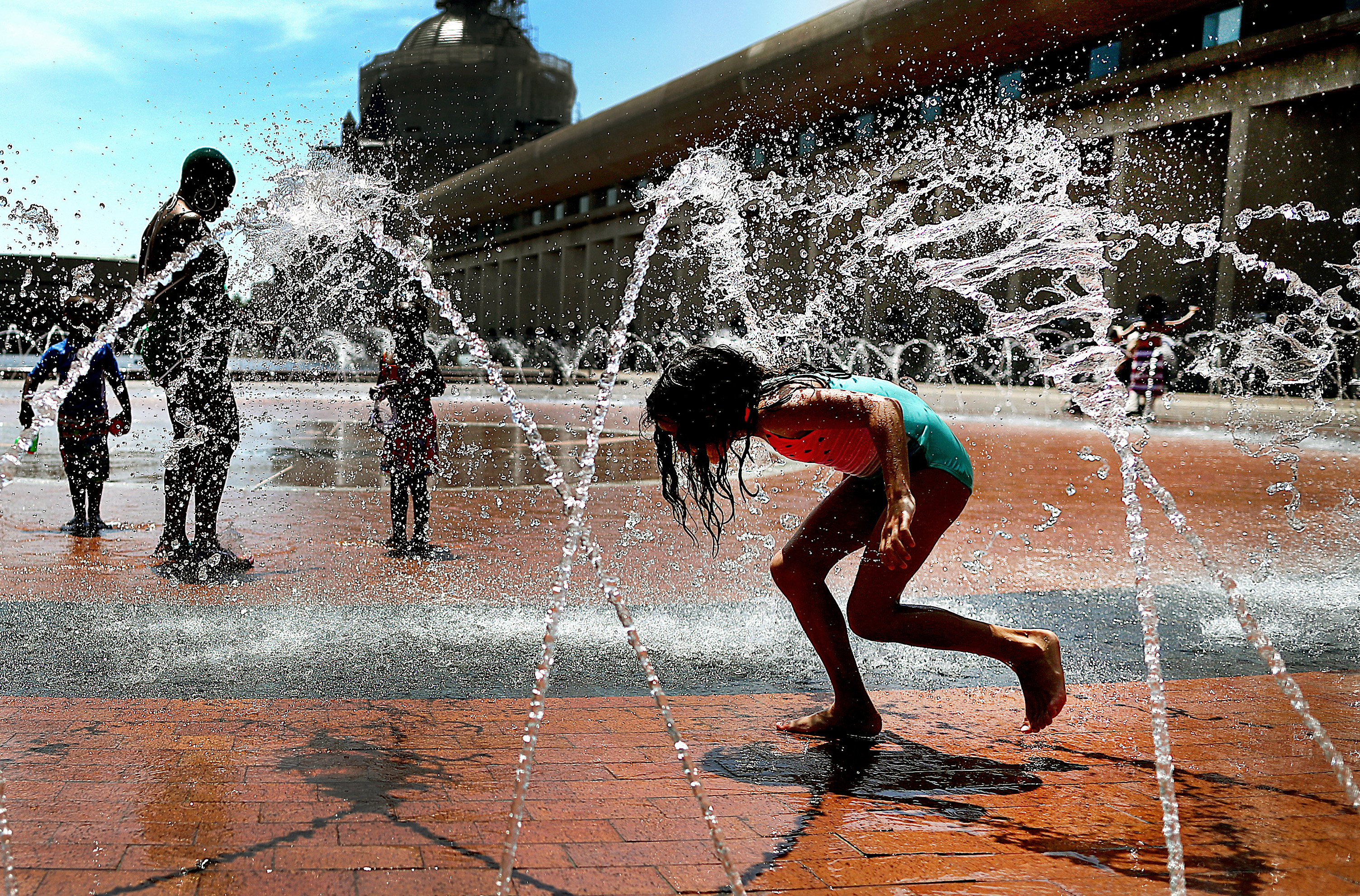 The fountain at the Christian Science Plaza provided cool relief for the hot weather during an afternoon in early June.