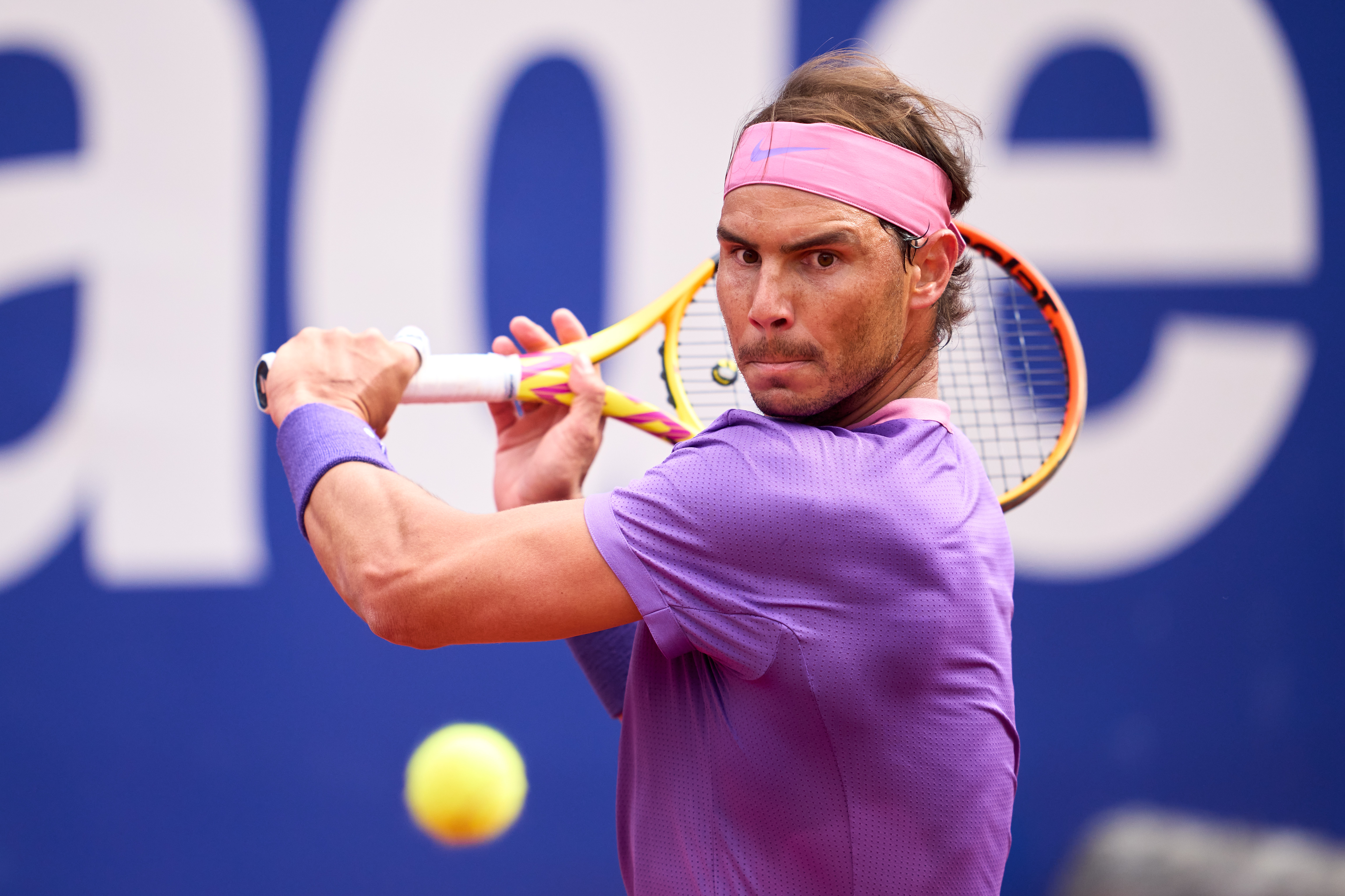 BARCELONA, SPAIN - APRIL 21: Rafael Nadal of Spain plays a backhand against Ilya Ivashka of Belarus in their second round match during day three of the Barcelona Open Banc Sabadell 2021 on April 21, 2021 in Barcelona, Spain. (Photo by Alex Caparros/Getty Images)