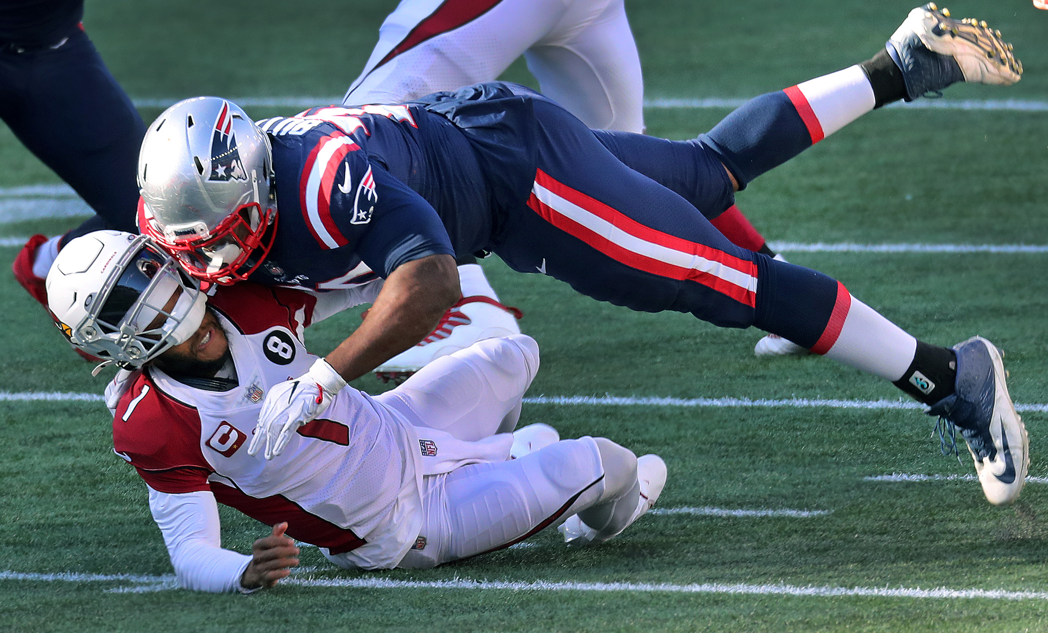 Adam Butler lands on top of Kyler Murray at the end of this play Sunday.