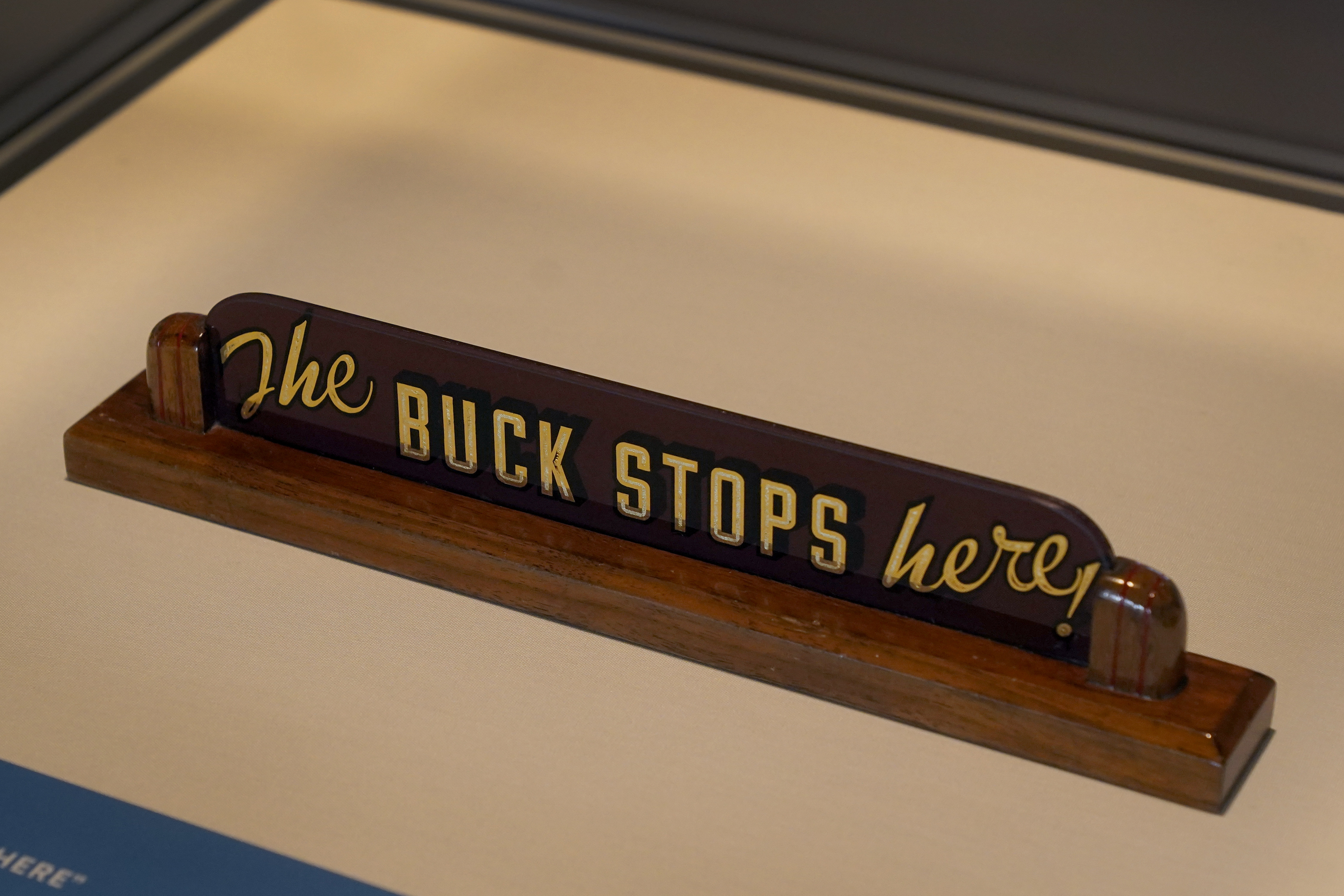 A sign that once sat on President Truman's desk, on display at his Presidential Library and Museum in Independence, Mo.