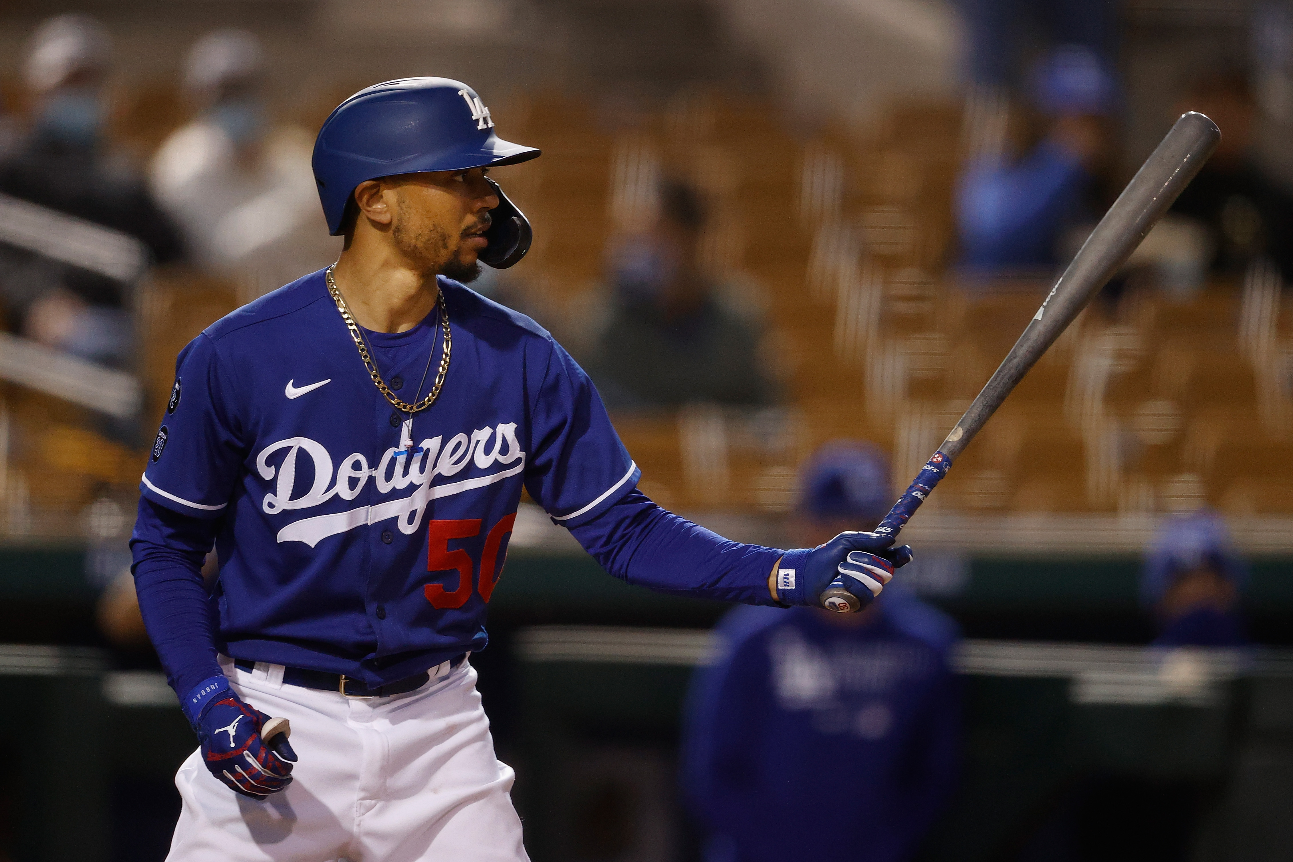 Dodgers and Padres' booths on Torres' hat 