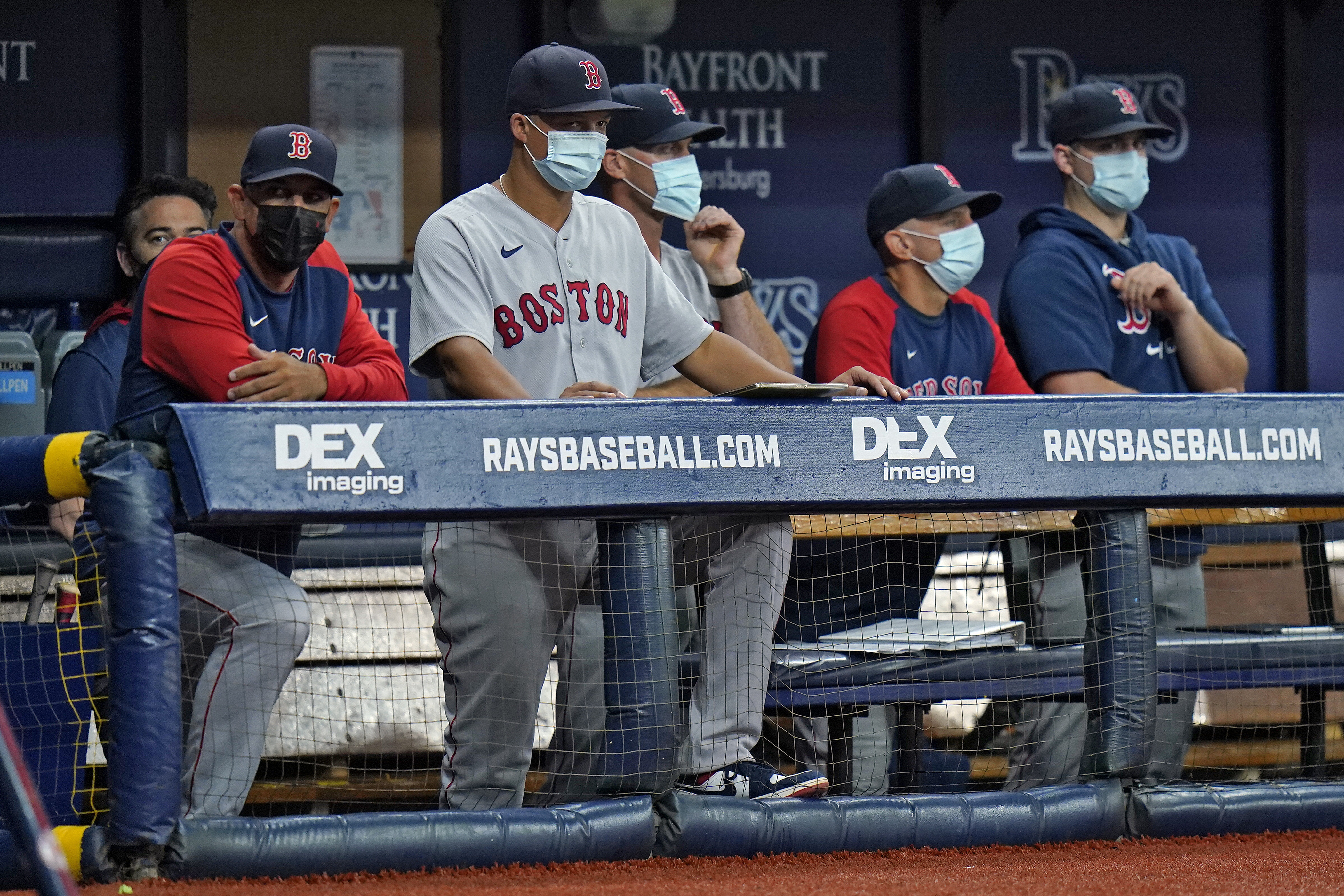 Alex Cora and the rest of the Red Sox coaching staff were masked up for Monday's game against the Rays.