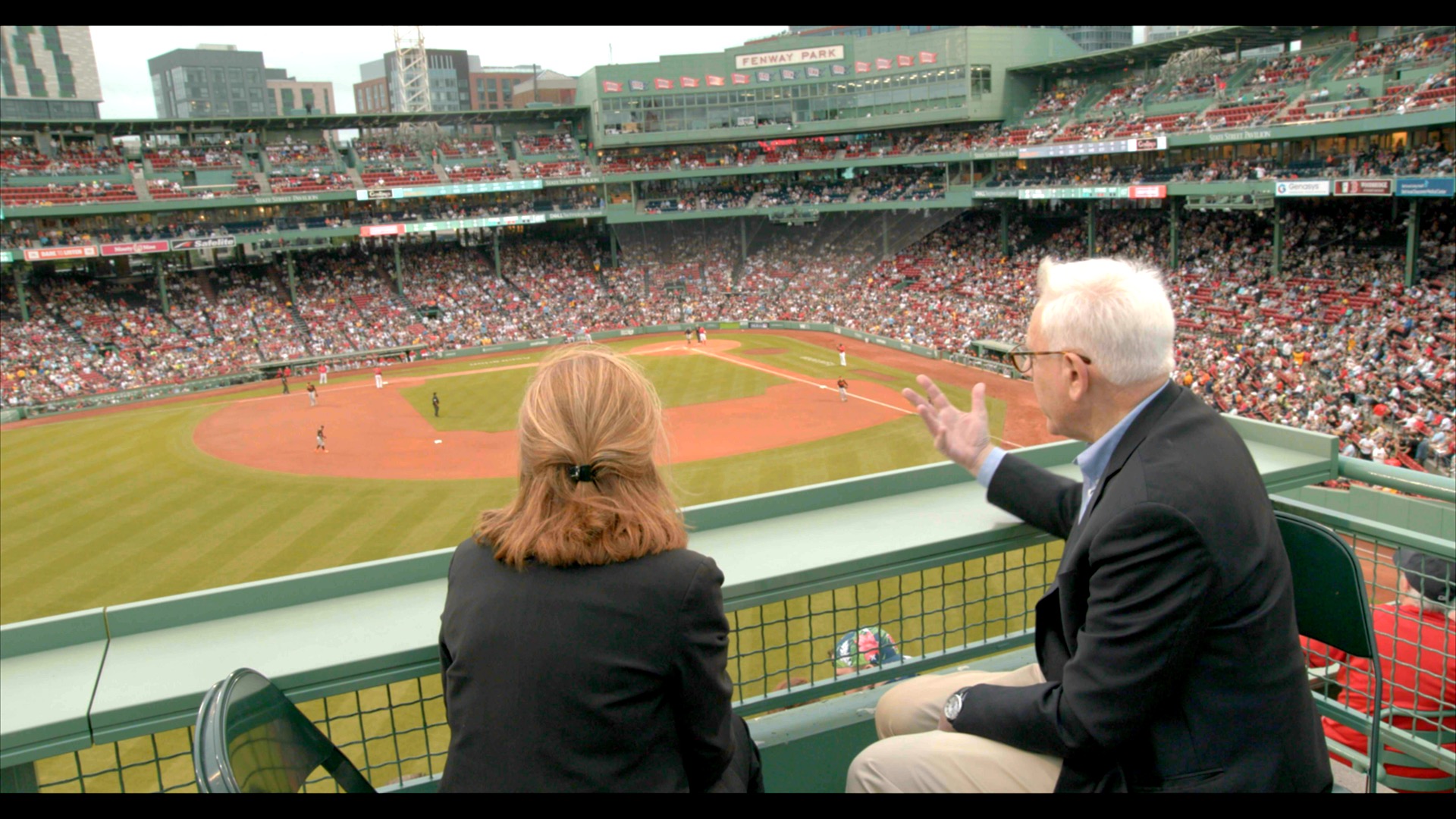 Milton man works inside the Green Monster at Fenway Park