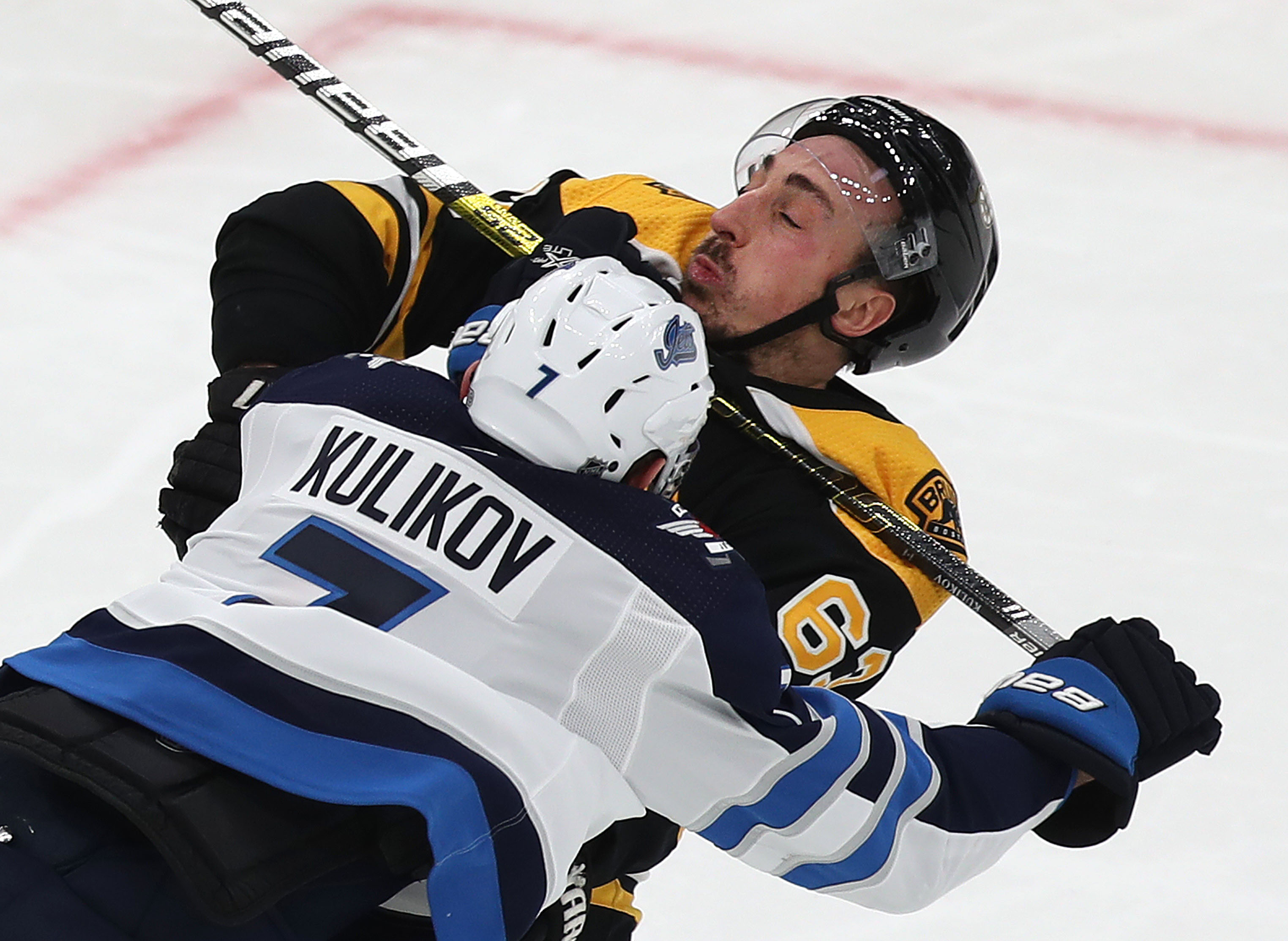 Bruins forward Brad Marchand got stopped in his tracks racing towards the Jets net by Winnipeg’s Dmitri Kulikov during the teams’ game in Boston on January 9.