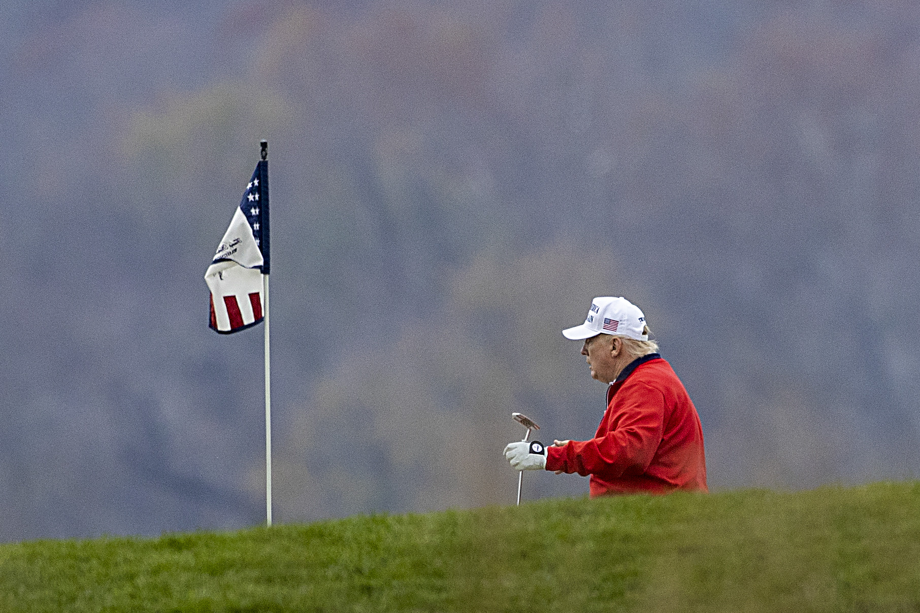 President Trump golfs at Trump National Golf Club in Sterling, Virg., on Nov. 21. (Photo by Tasos Katopodis/Getty Images)
