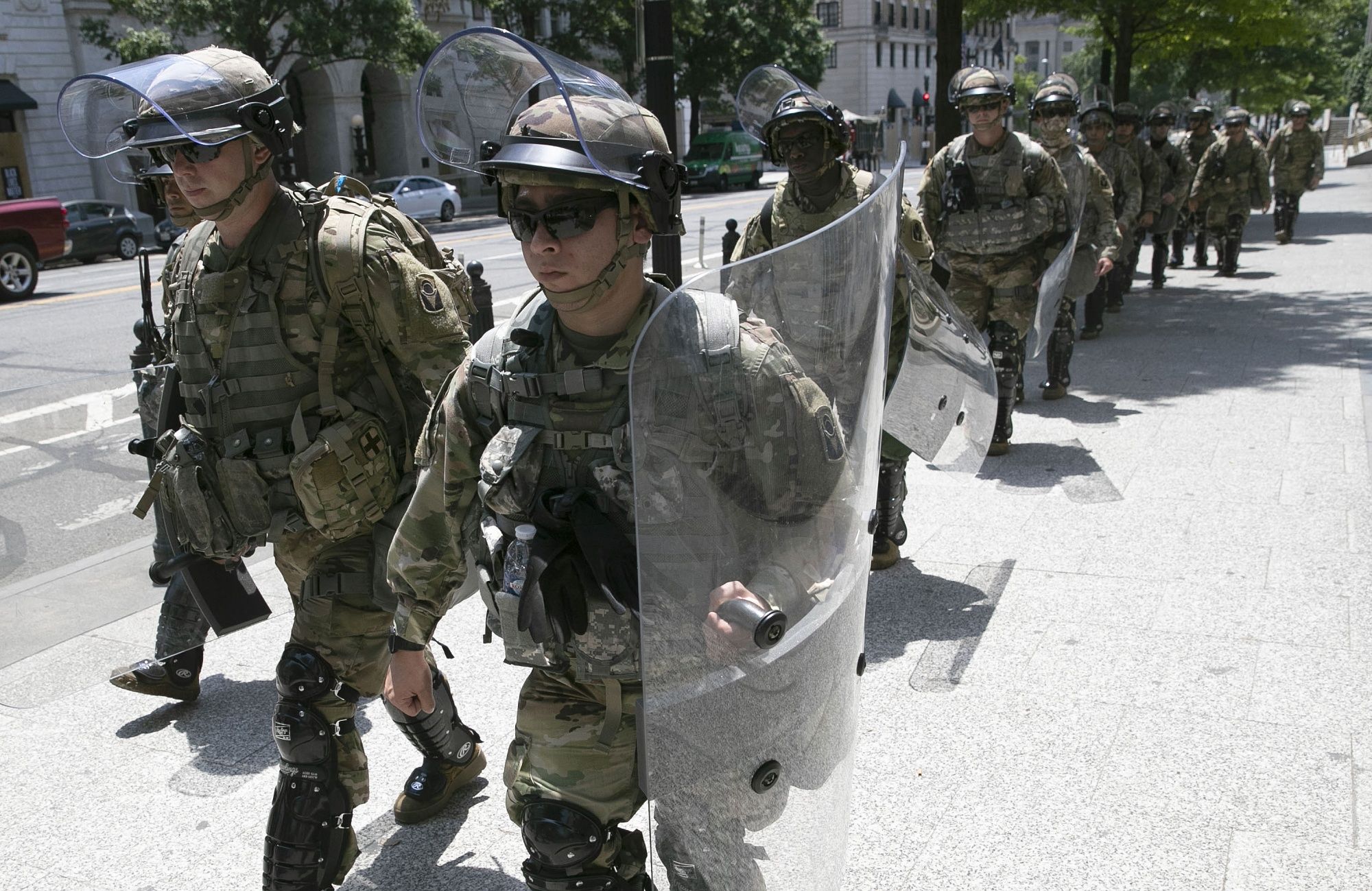 Members of an airborne military unit marched outside the US Treasury Building in Washington, D.C.