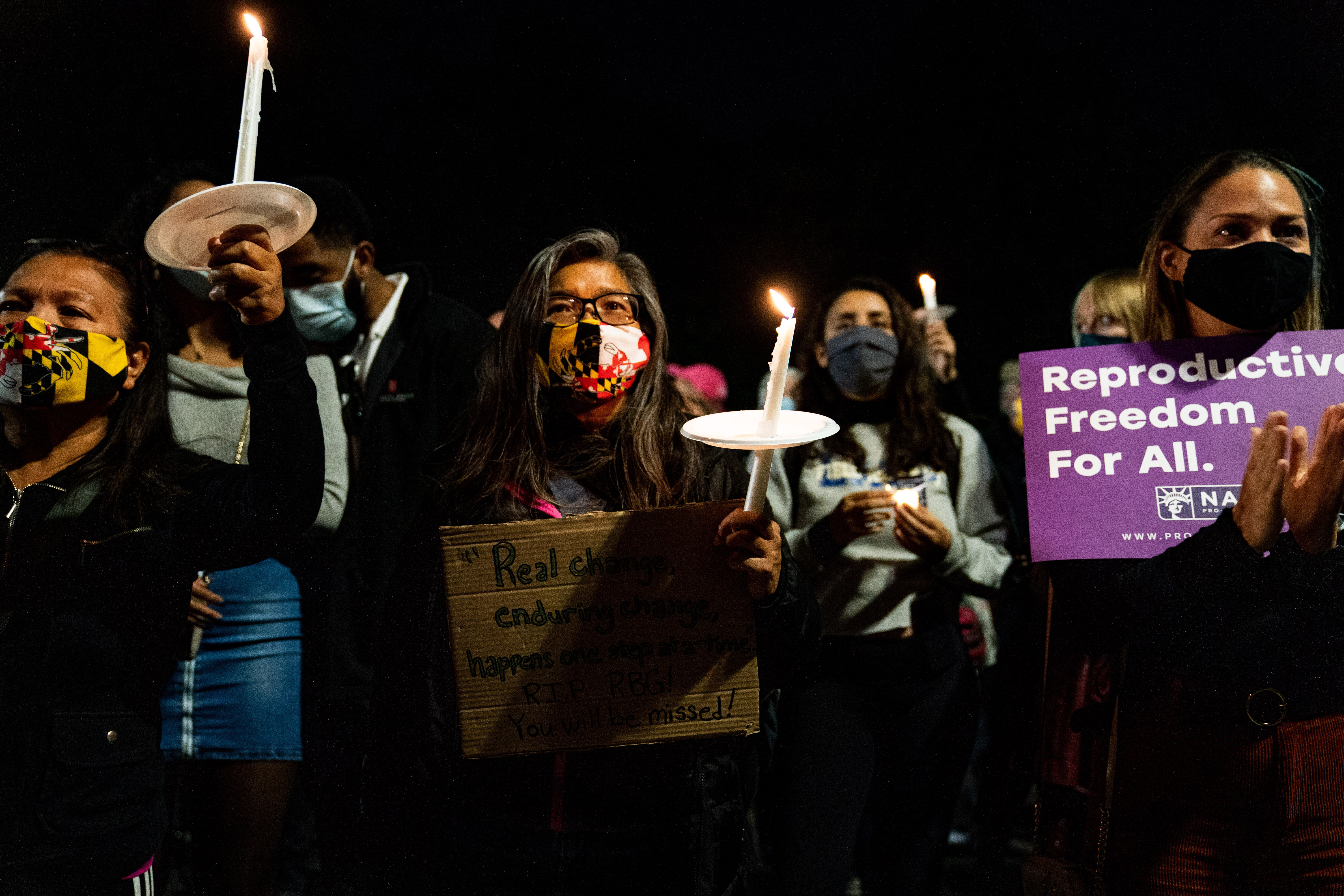 People attended a vigil honoring the late Justice Ruth Bader Ginsburg at the Supreme Court building on Sept. 19.