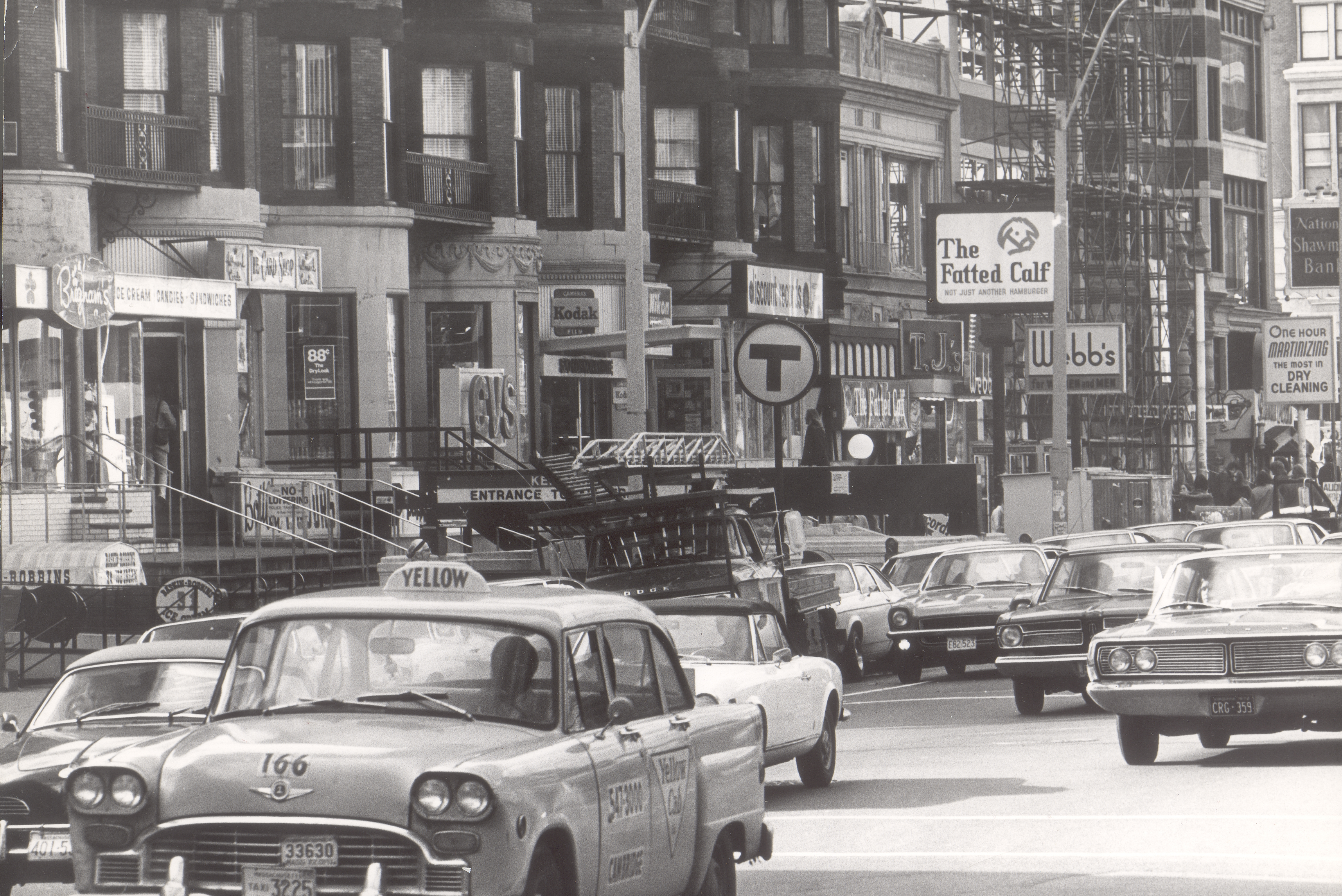 Commonwealth Avenue in Kenmore Square in 1972. Buildings on this block were razed in 2000 to clear space for the Hotel Commonwealth, which opened in 2003. The opening of Eastern Standard, Island Creek Oyster Bar, and The Hawthorne followed years later.