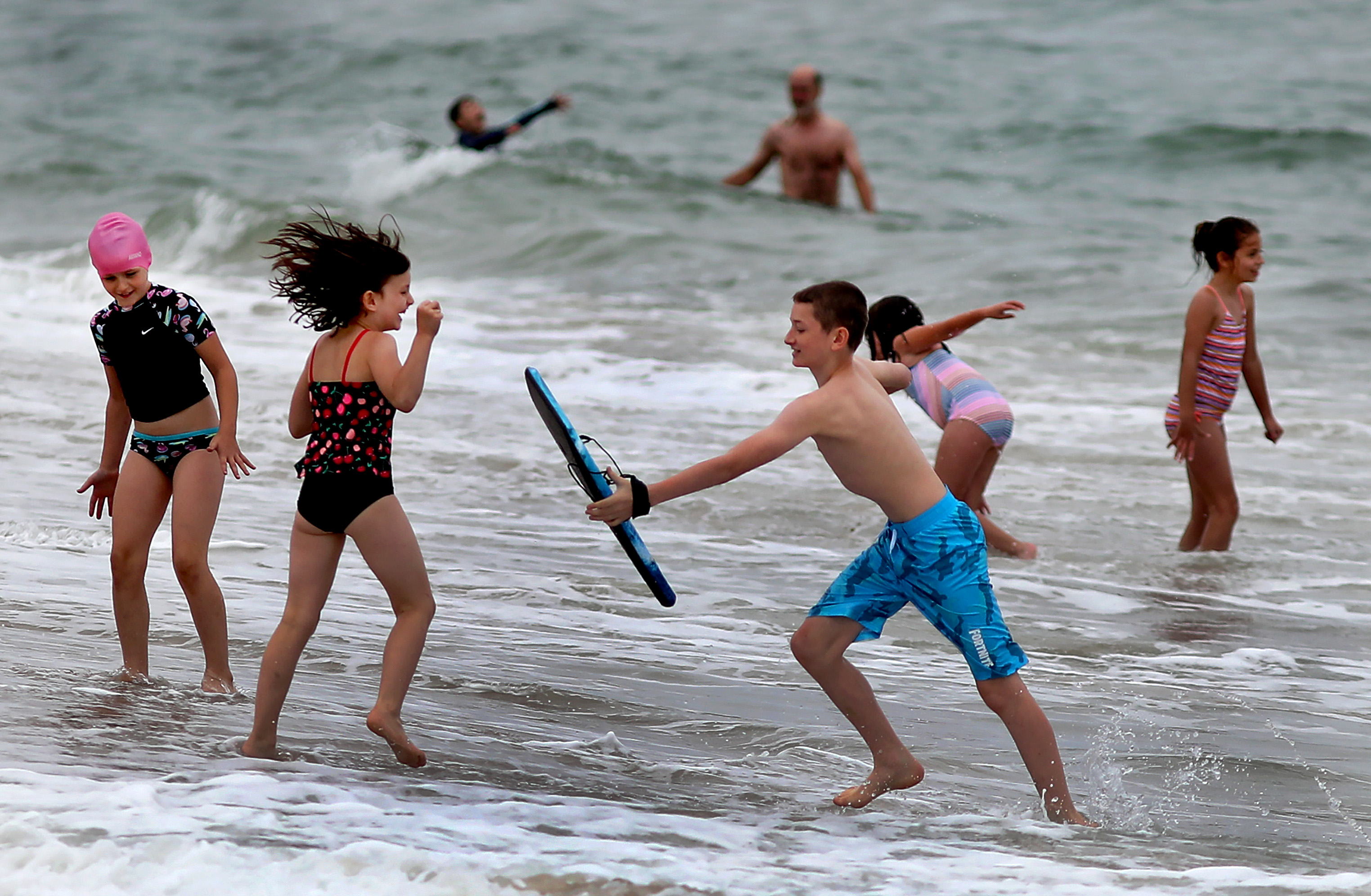 Youngsters played in the surf at Coast Guard Beach.