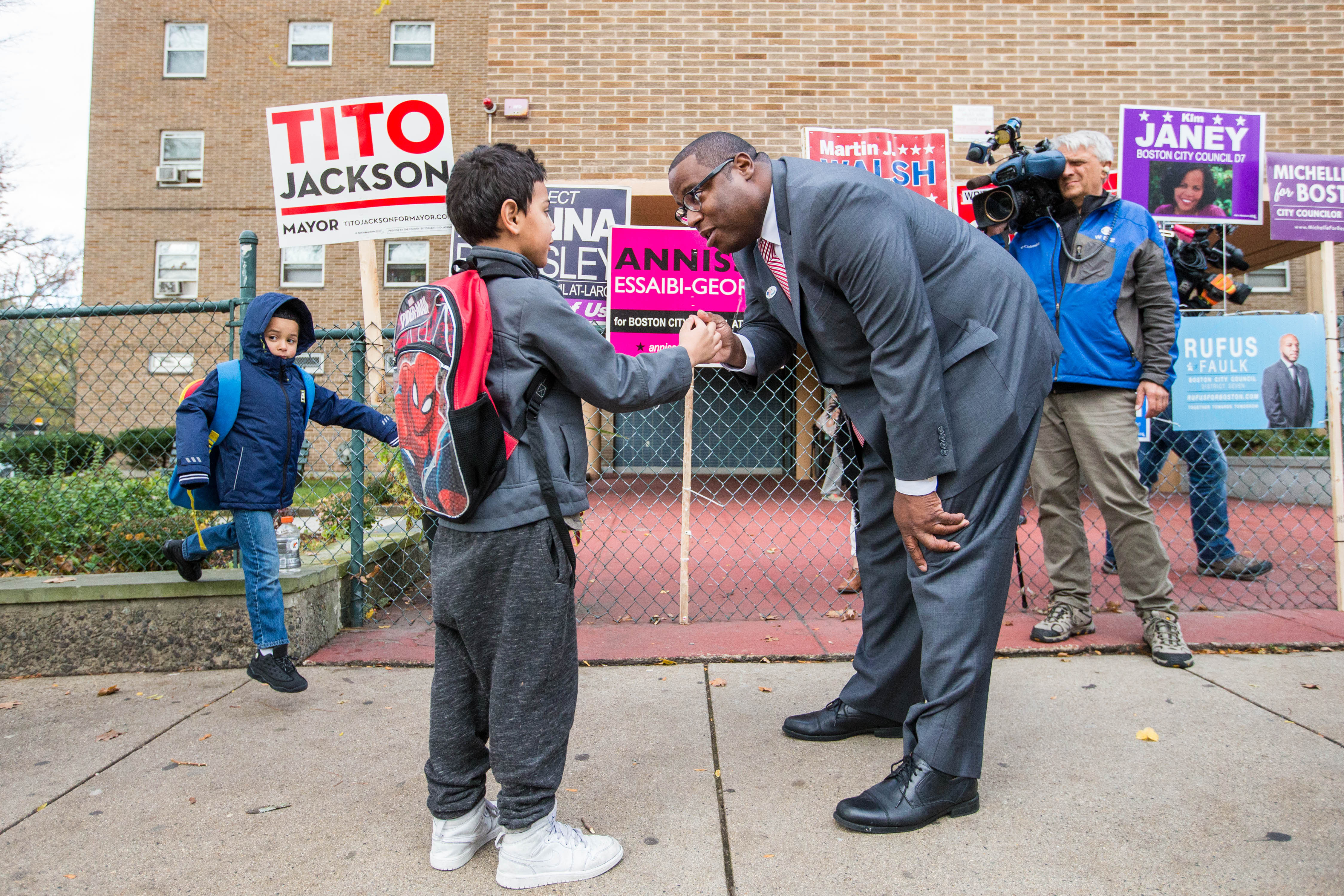 Mayoral candidate Tito Jackson spoke with children on their way to school on Election Day 2017.