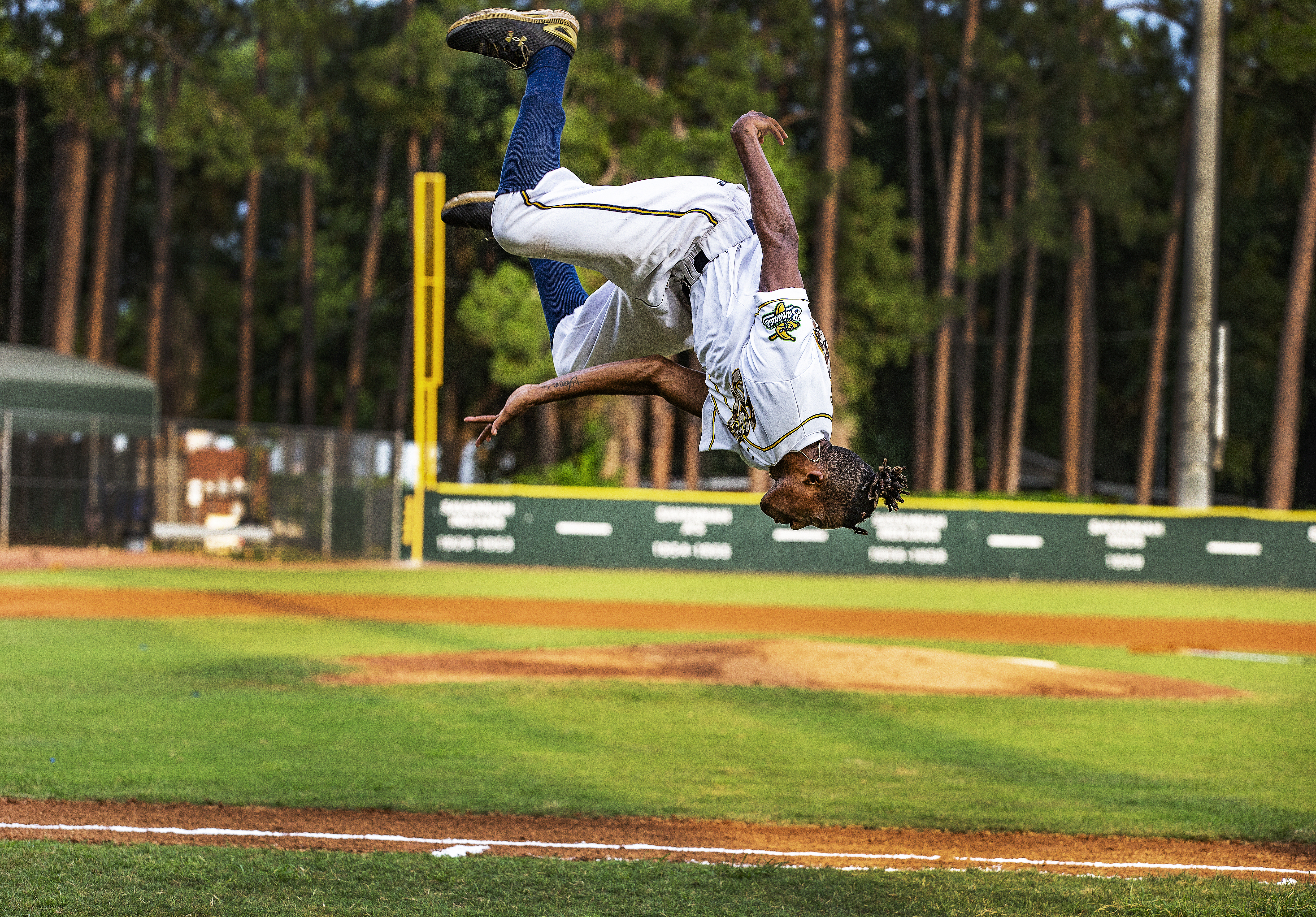 Maceo Harrison, Savannah's first base coach, took the field with style.