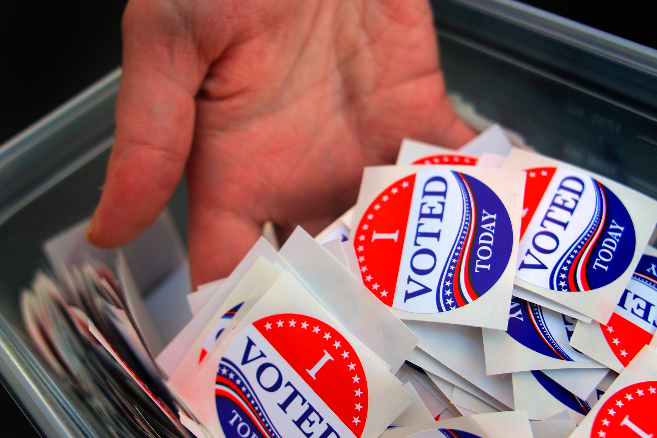 Caroline Kleeman bought 1,000 "I Voted" stickers online for friends and neighbors who will miss out on receiving one. (Lane Turner/Globe Staff)