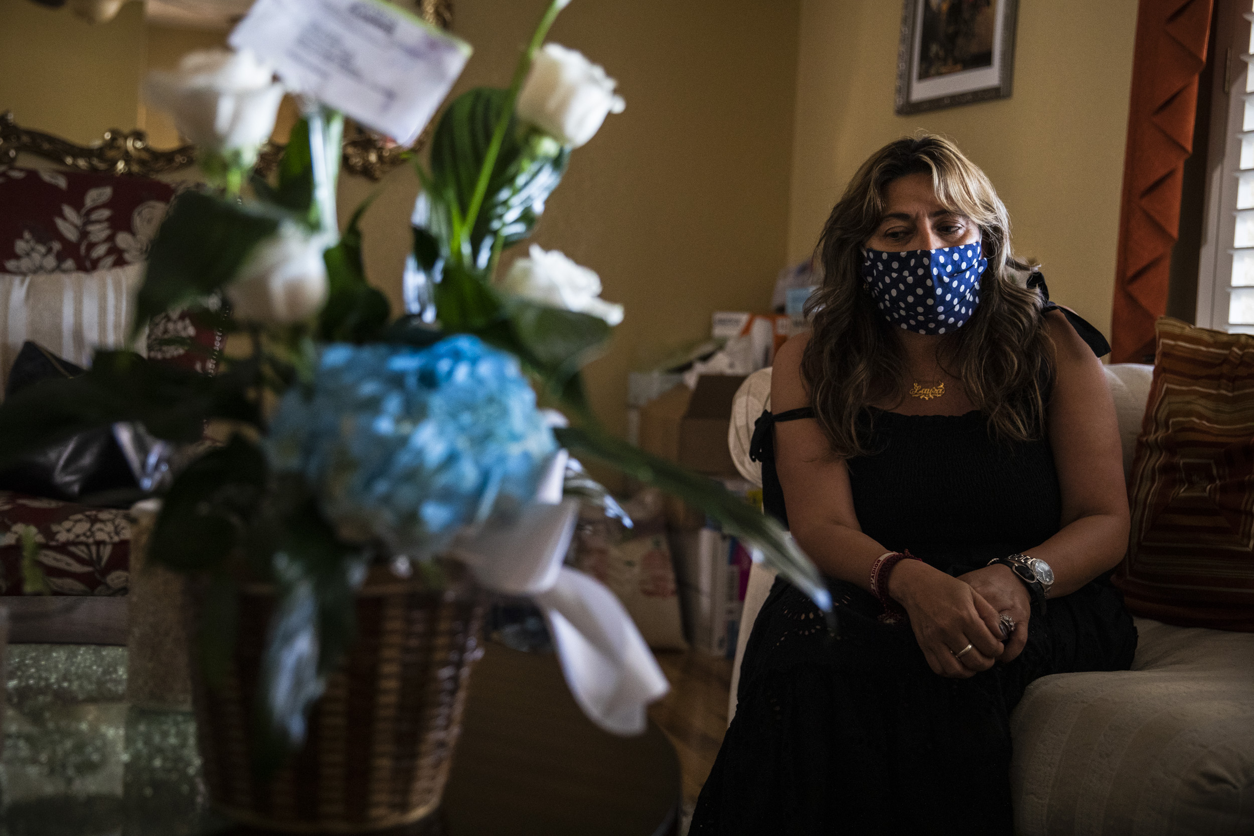 Laura Sanchez paused while talking about her father, Sergio Peña Acosta, who died from COVID-19 earlier in the week.