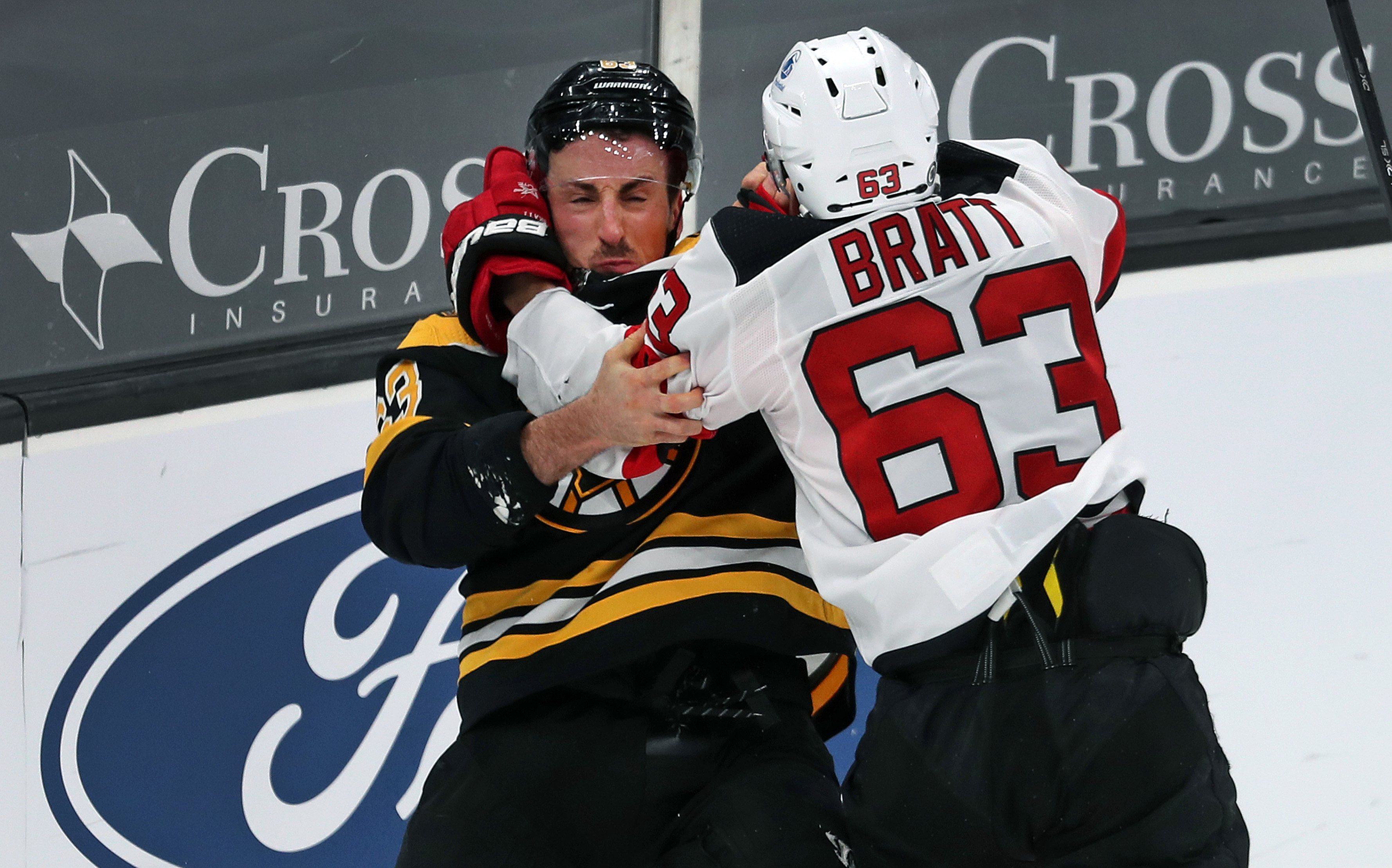 After Brad Marchand went airborne to slam into New Jersey's Dmitry Kulikov (not pictured) in the second period Tuesday, it sparked a quick fight between Marchand and New Jersey's Jesper Bratt.