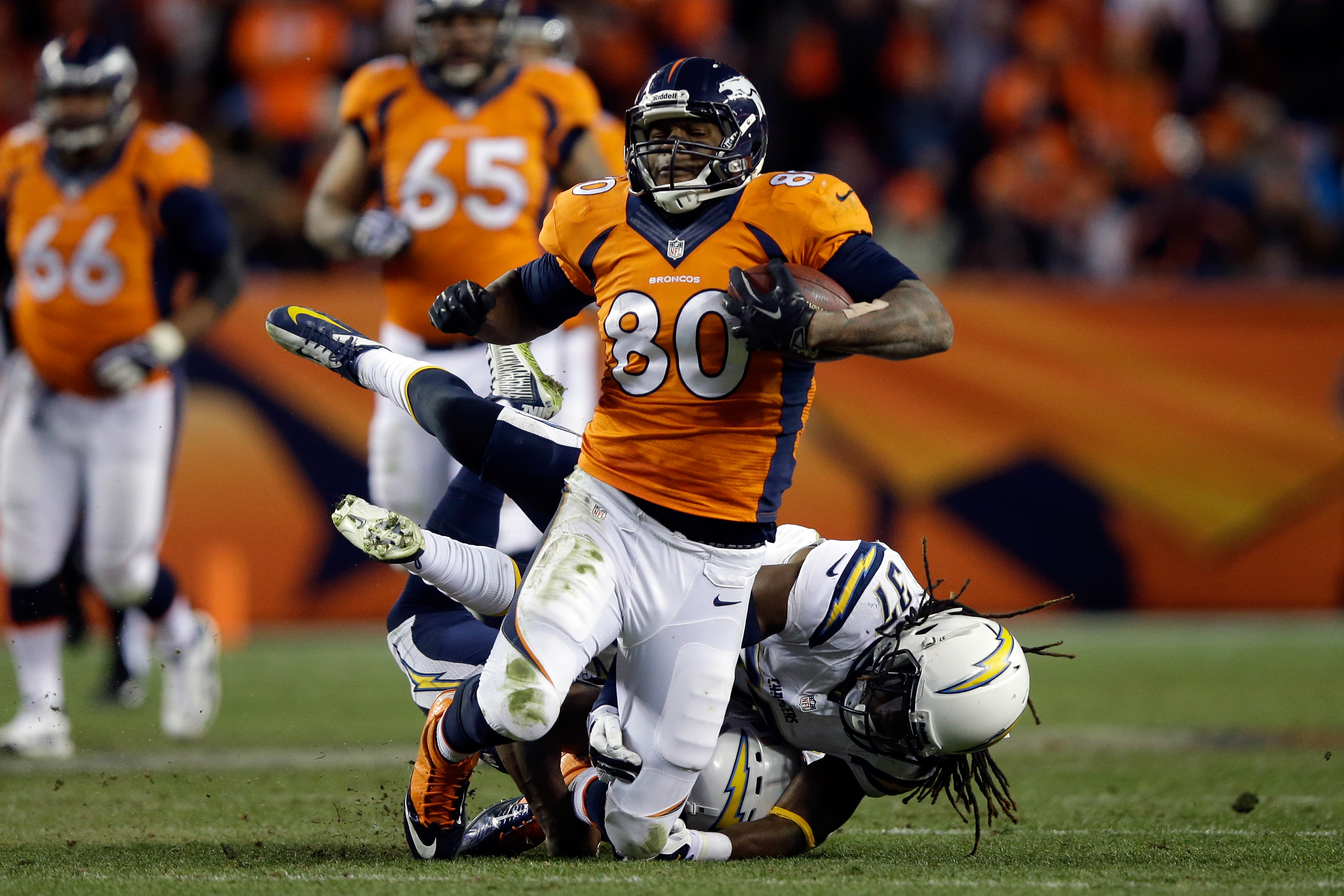 Denver Broncos tight end Julius Thomas (80) watches as the pass