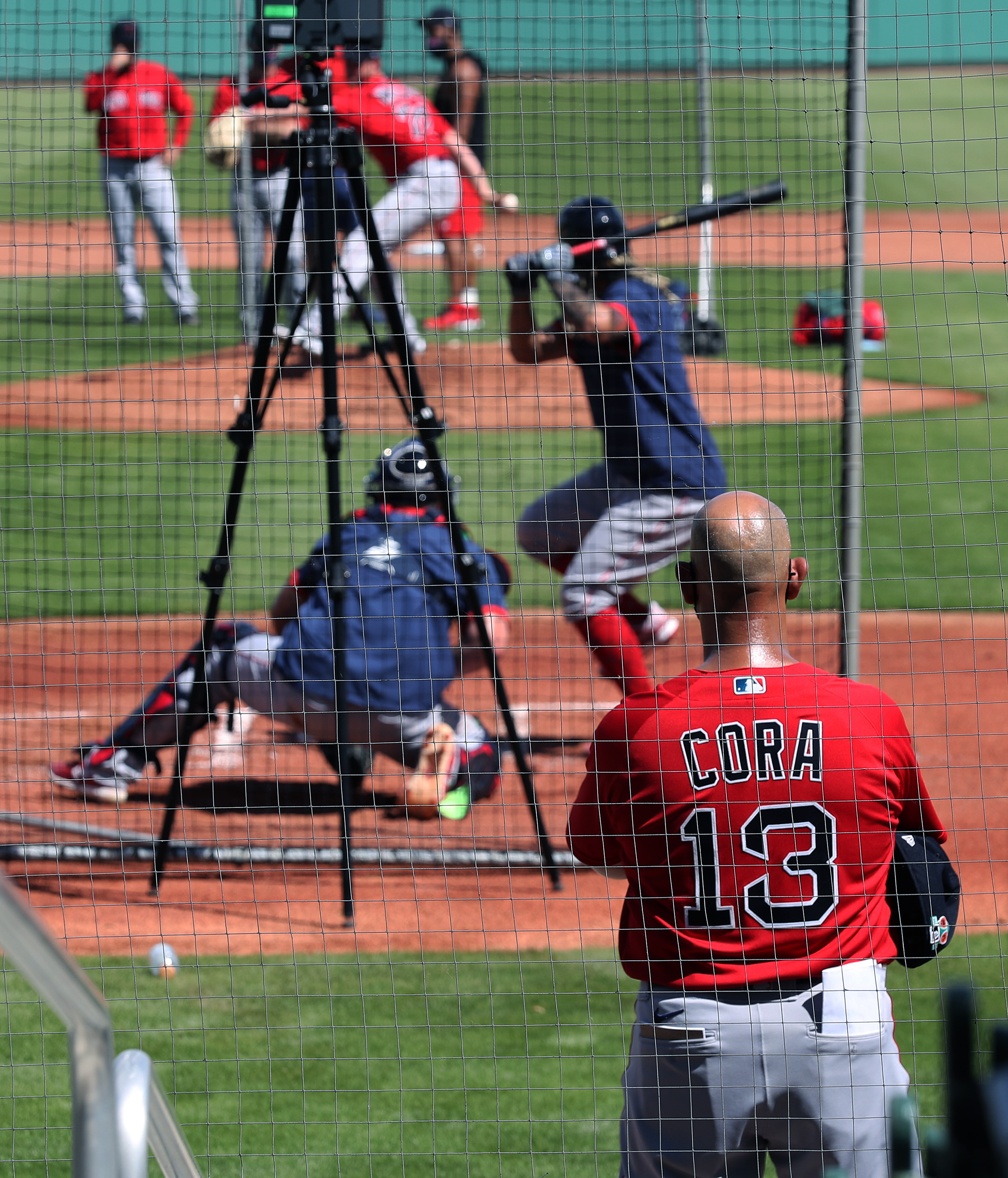 Alex Cora watched live batting practice.