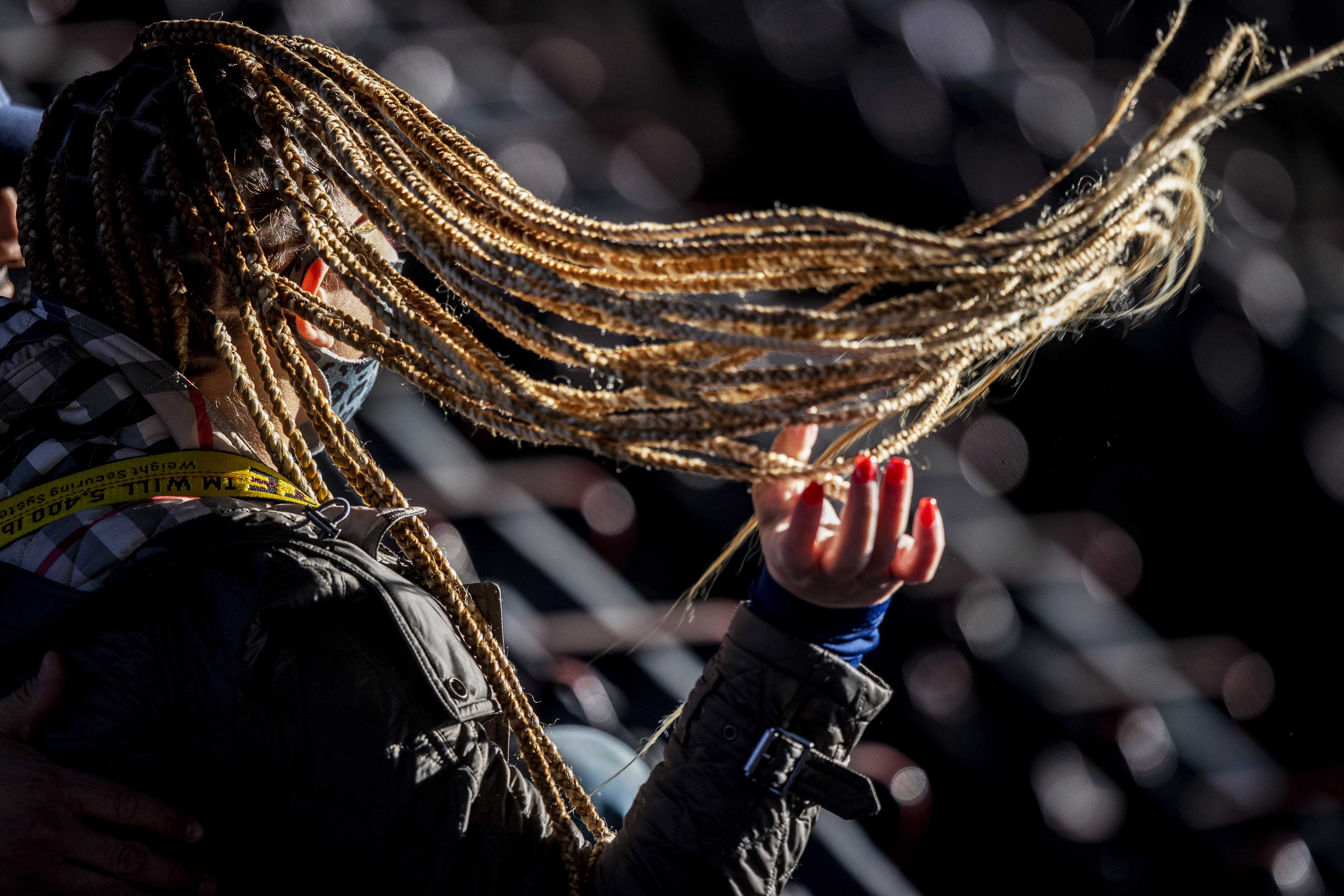 Karina Vargas of New York had plenty of room to let her hair down in the grandstand.