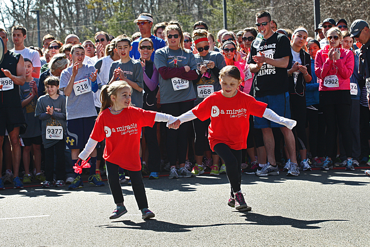 In April, a race for Caroline drew thousands, and she unexpectedly darted out to join the participants.